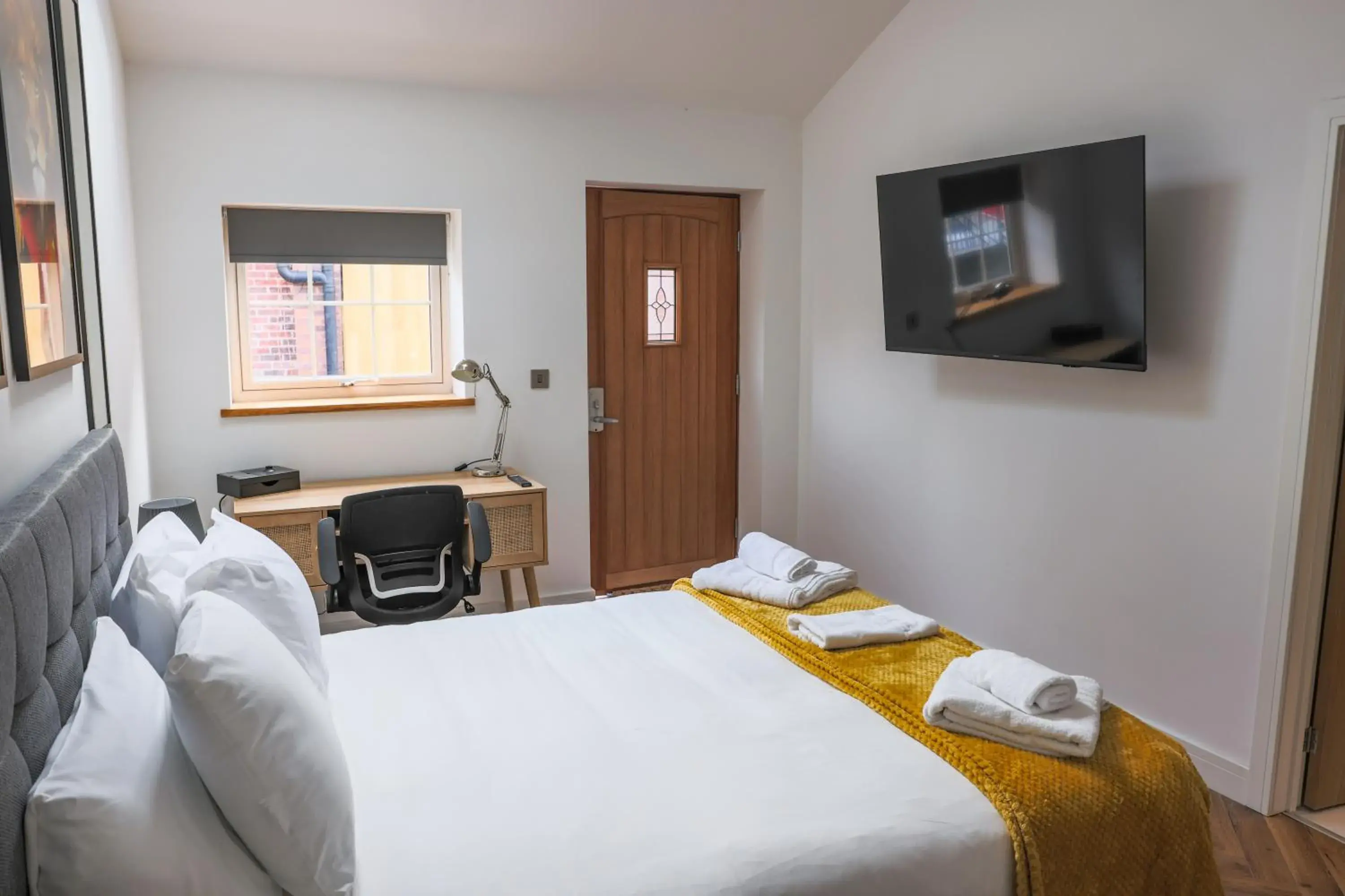 Bed in The Coach Hotel Bed in The Coach Hotel