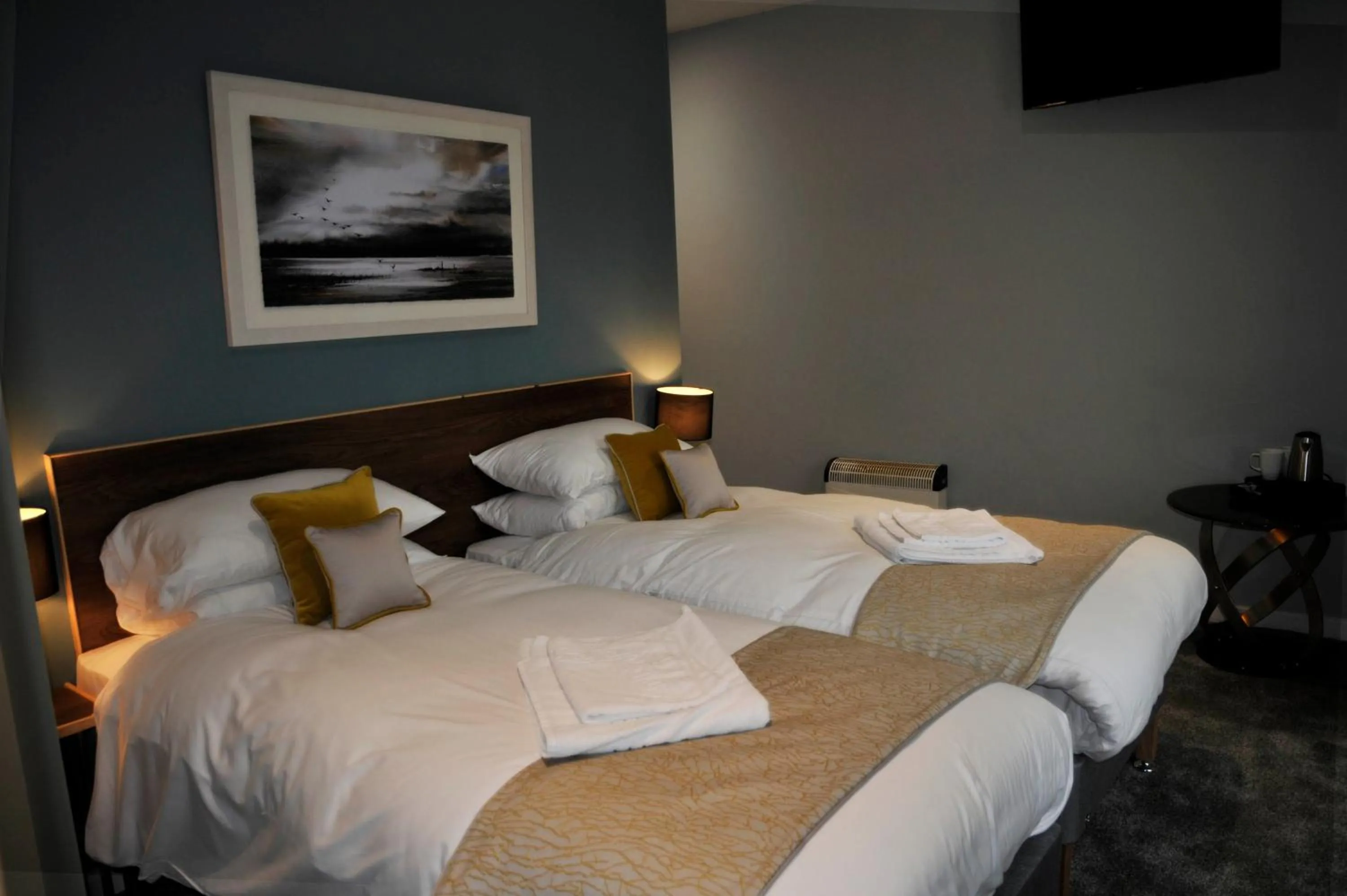 Bed in The Coach Hotel