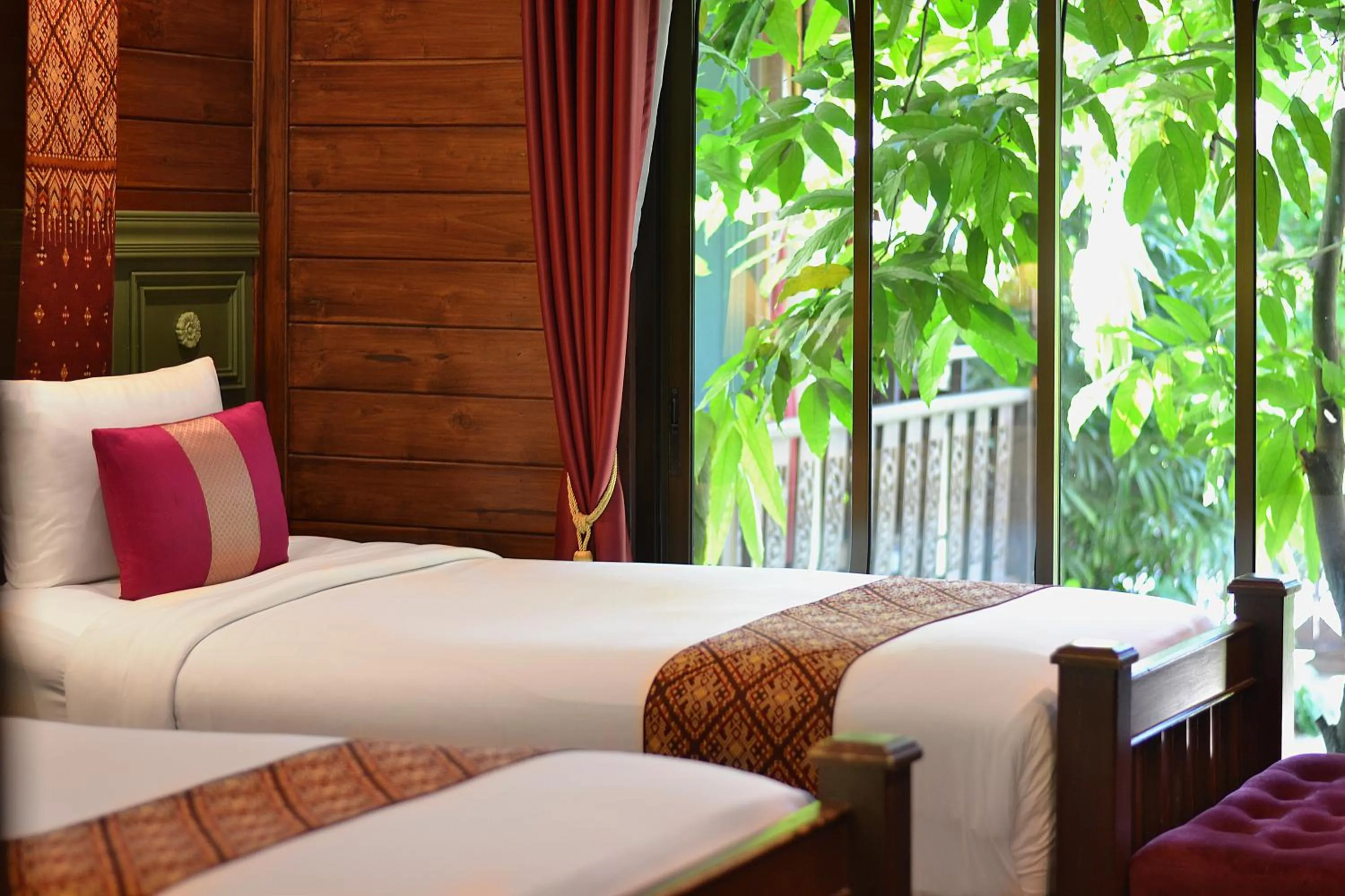 Bed in Thai Thai Sukhothai Resort