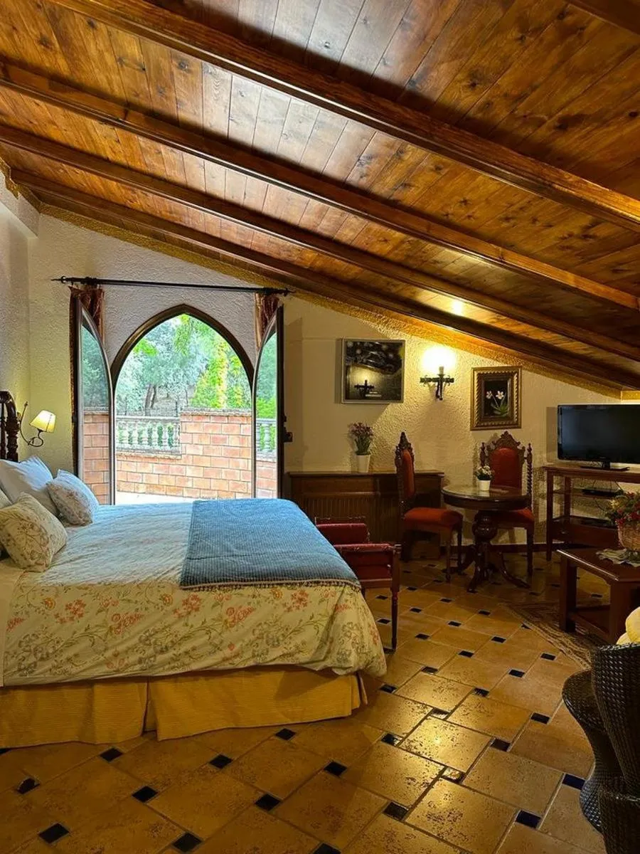Photo of the whole room, Bed in Hotel Rural Convento Santa Maria de la Sierra