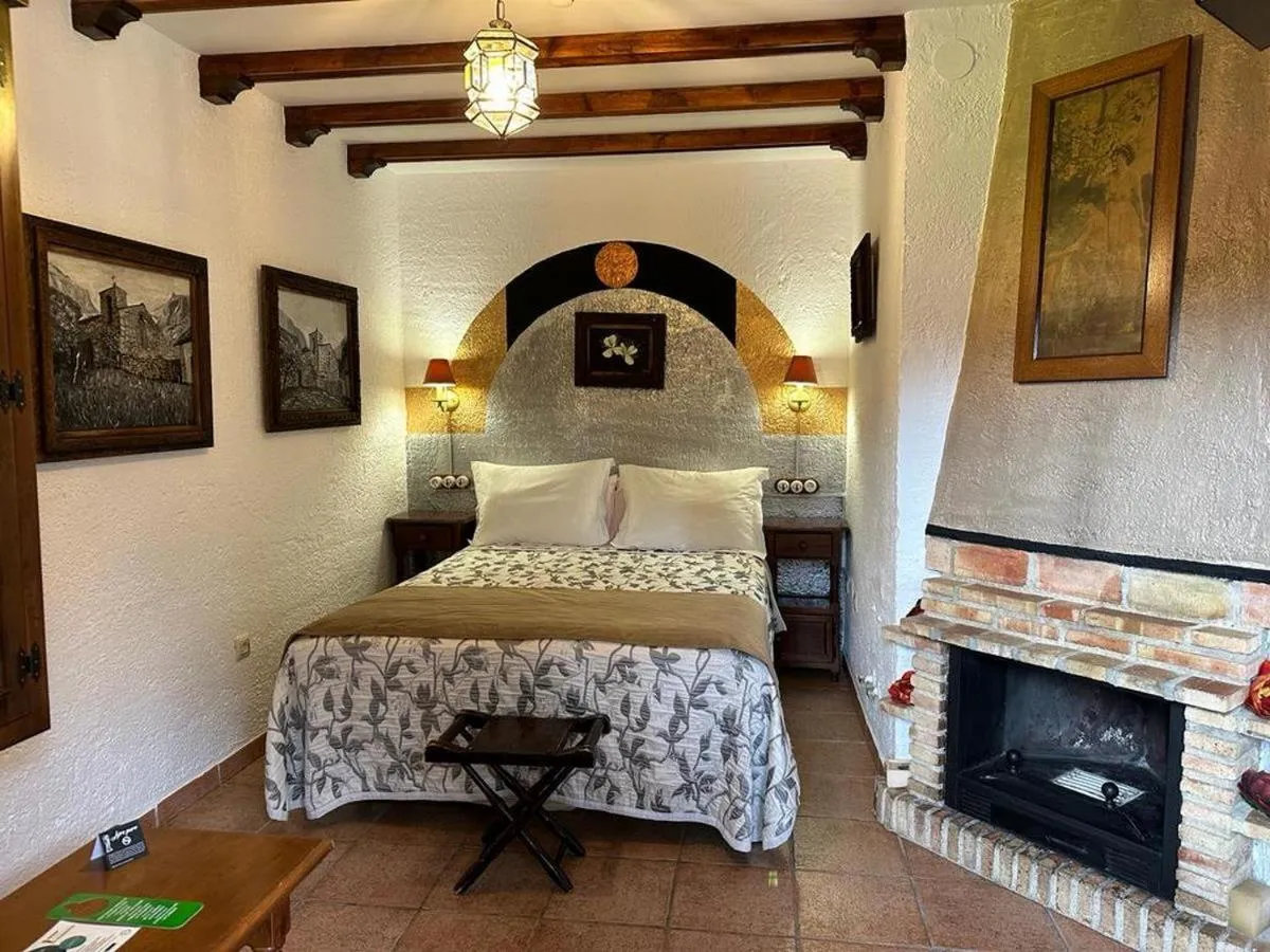 Bed in Hotel Rural Convento Santa Maria de la Sierra