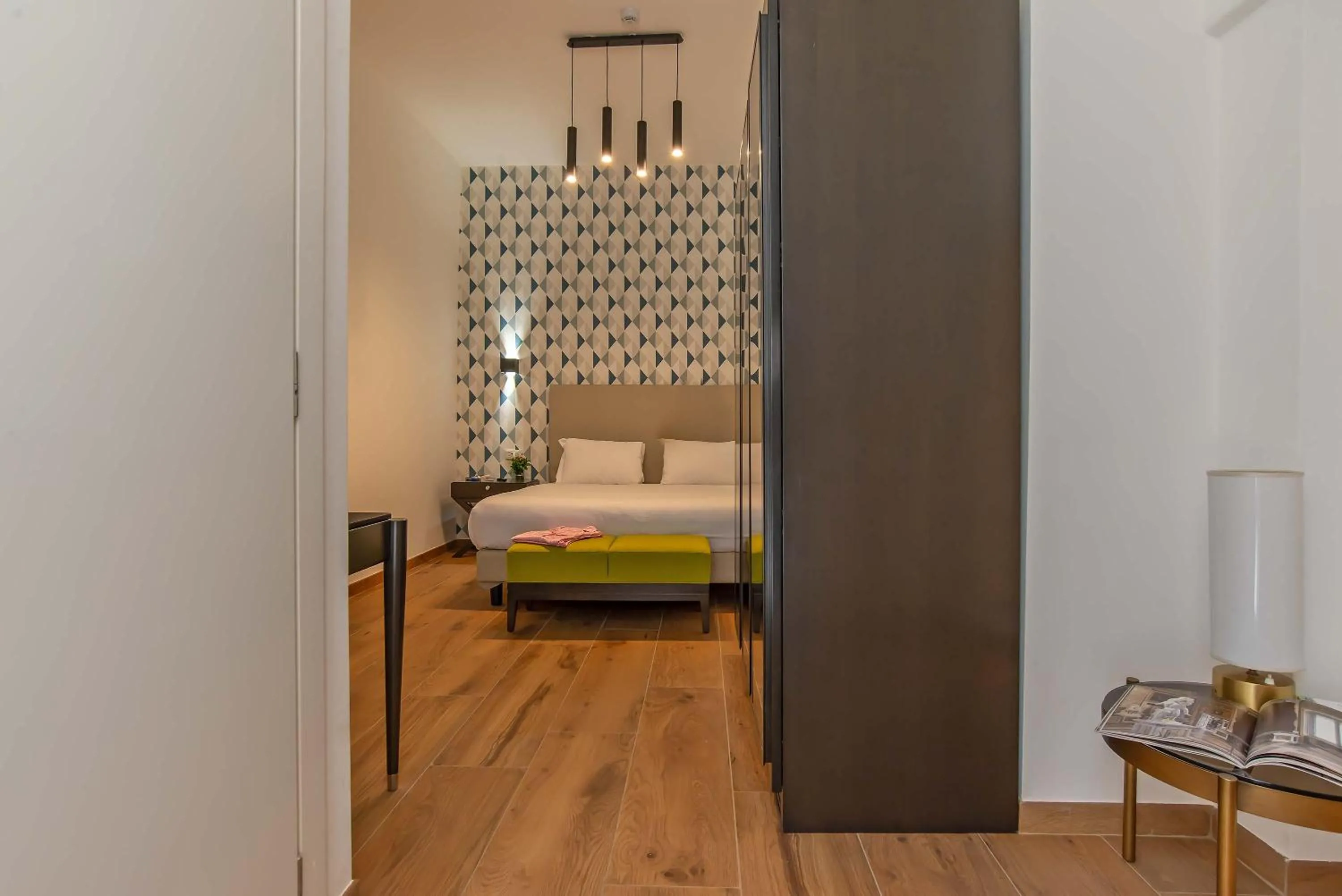 Bed in Navona Essence Hotel