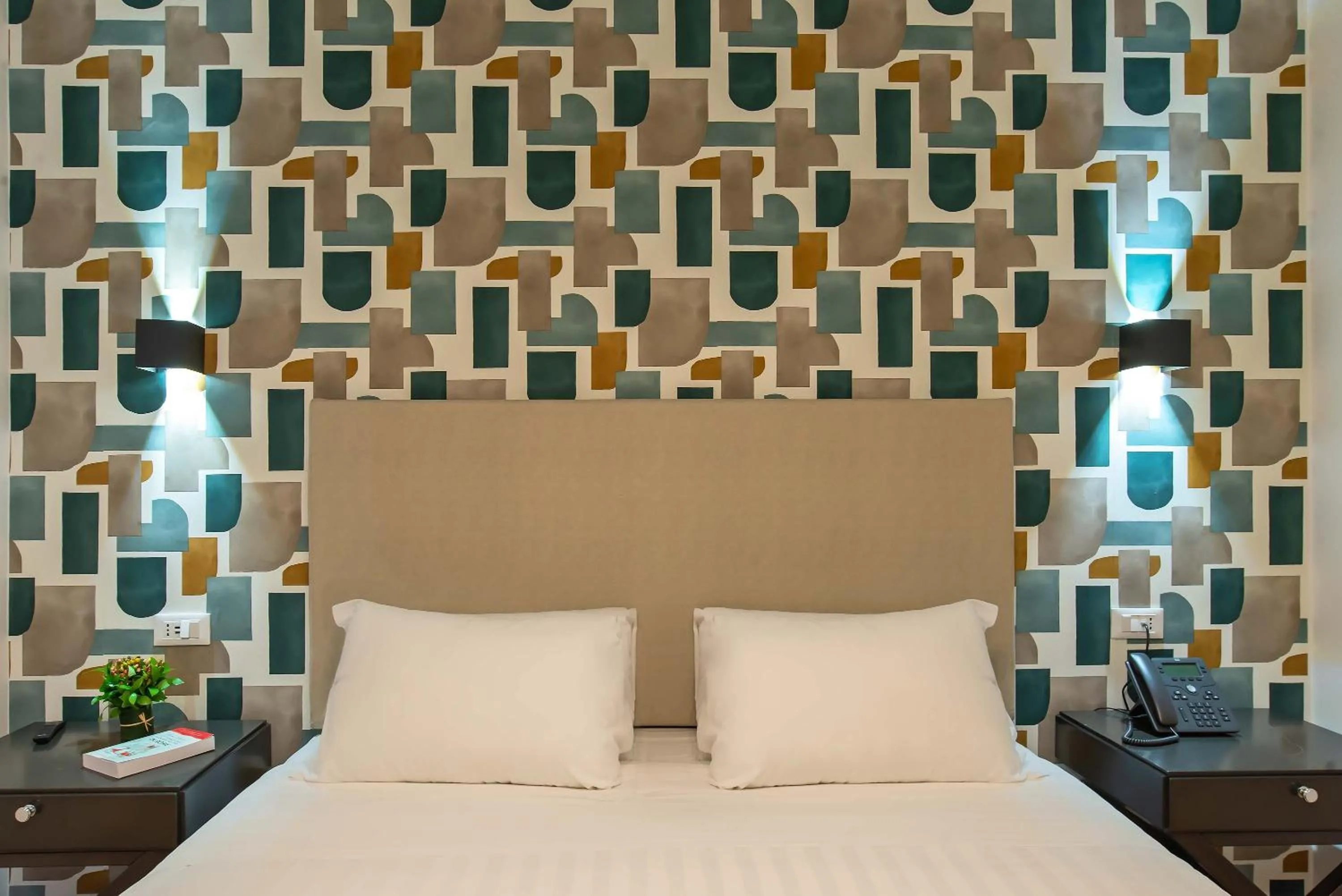 Bed in Navona Essence Hotel