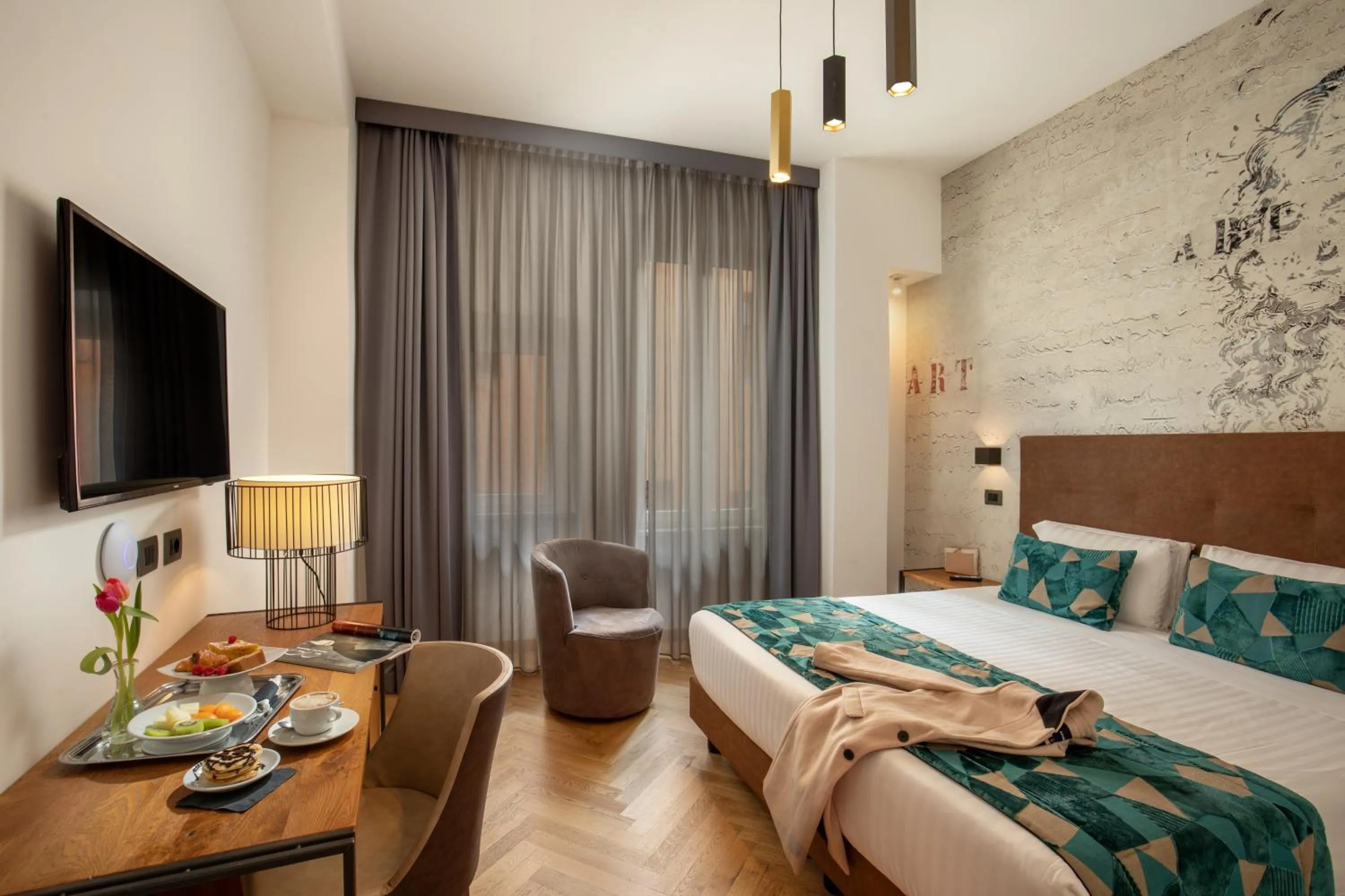 Bed in Navona Essence Hotel