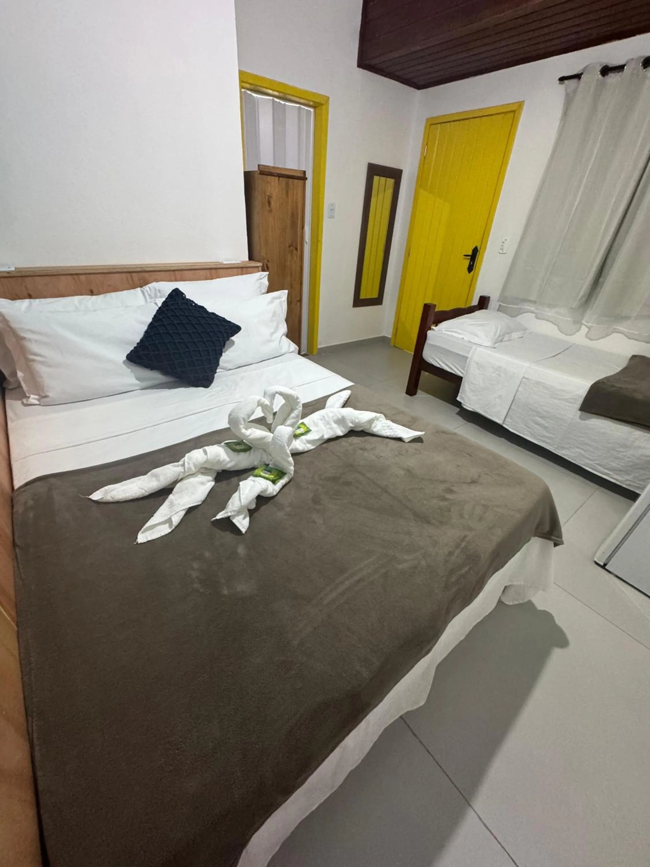 Bed in Pousada Tropical Araçatiba