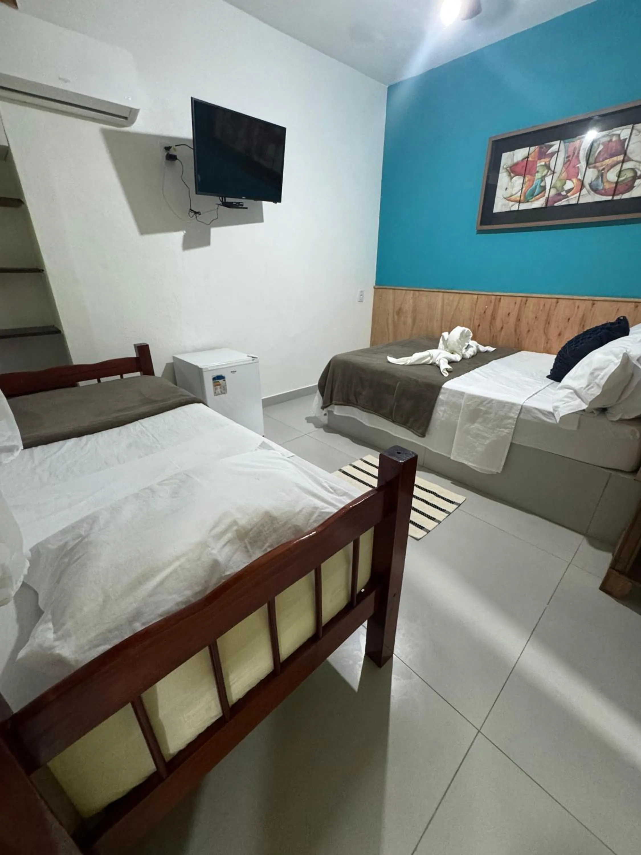 Bed in Pousada Tropical Araçatiba