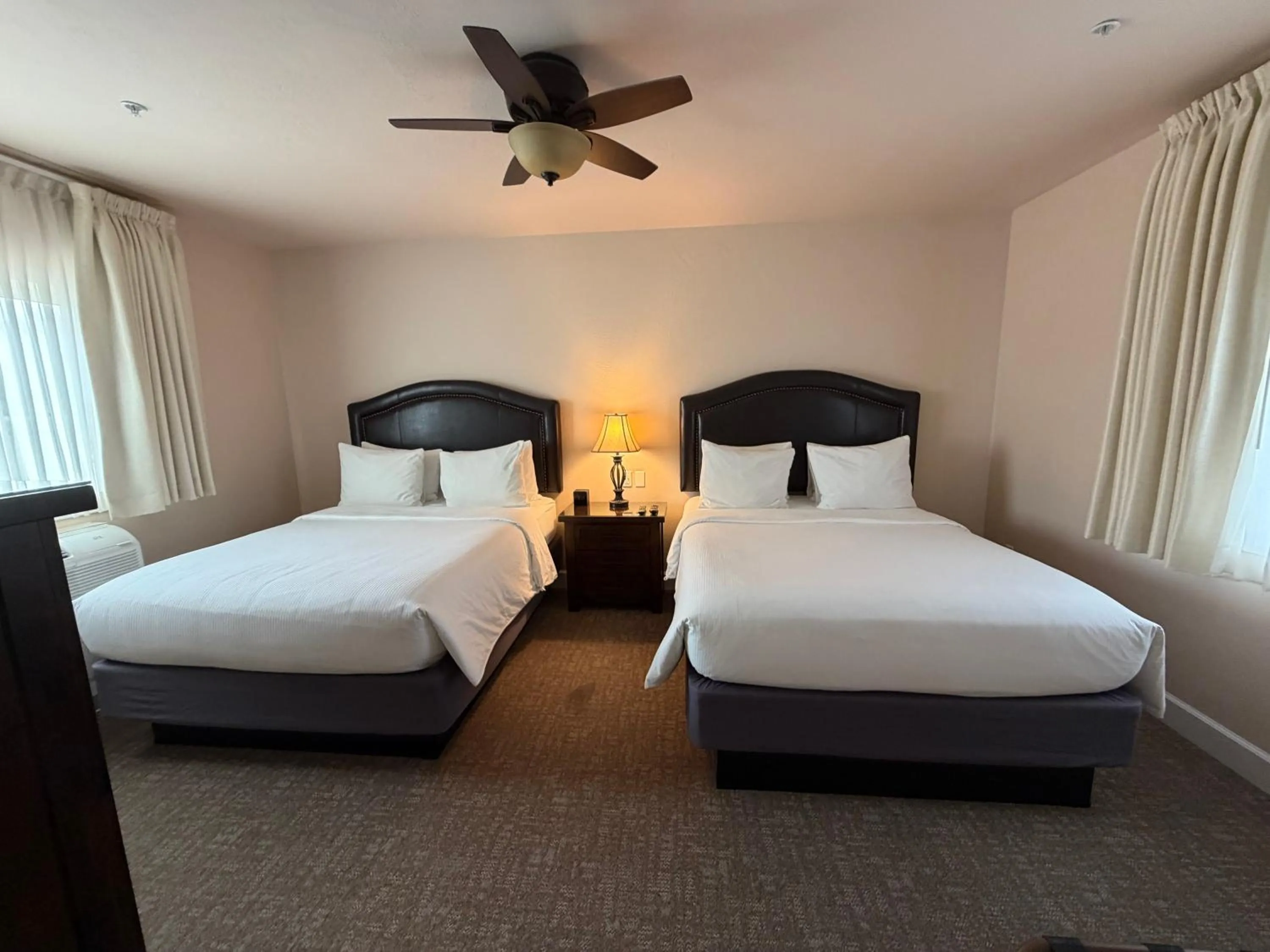 Bed in Resort at Eagle Point Golf Club Lodging