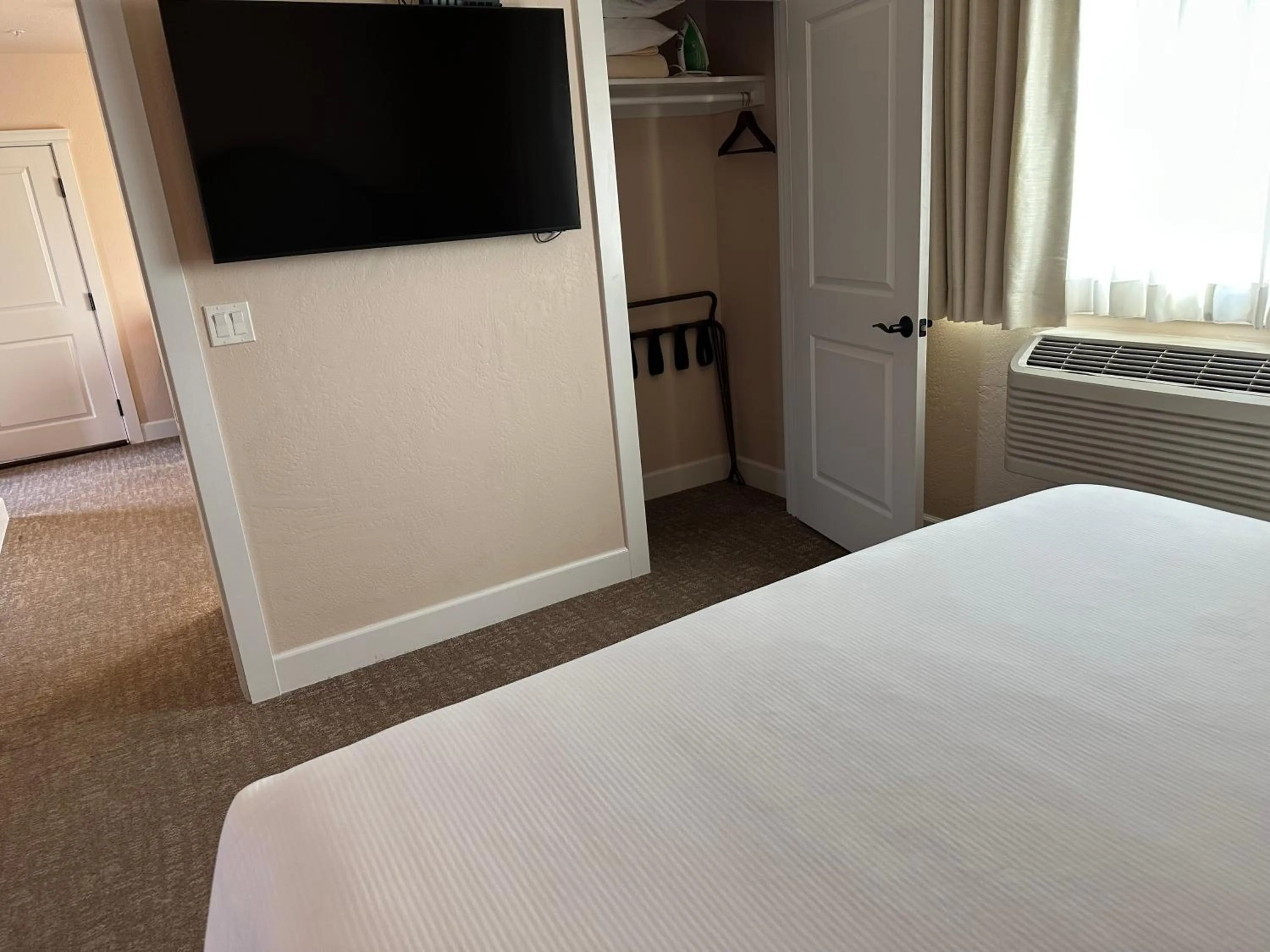 Bed in Resort at Eagle Point Golf Club Lodging