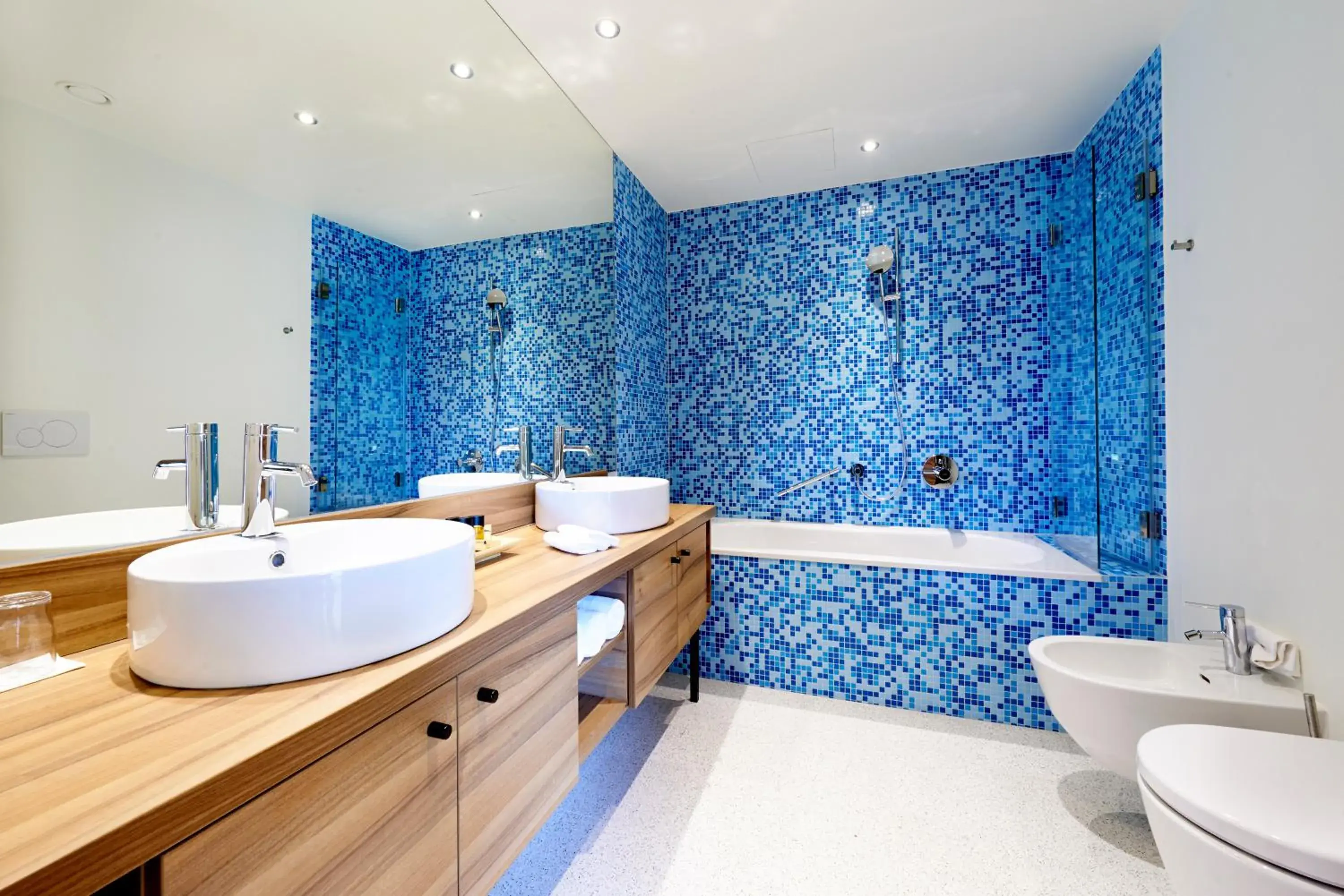 Bathroom in Parkhotel Pörtschach - Das Hotelresort mit Insellage am Wörthersee Bathroom in Parkhotel Pörtschach - Das Hotelresort mit Insellage am Wörthersee