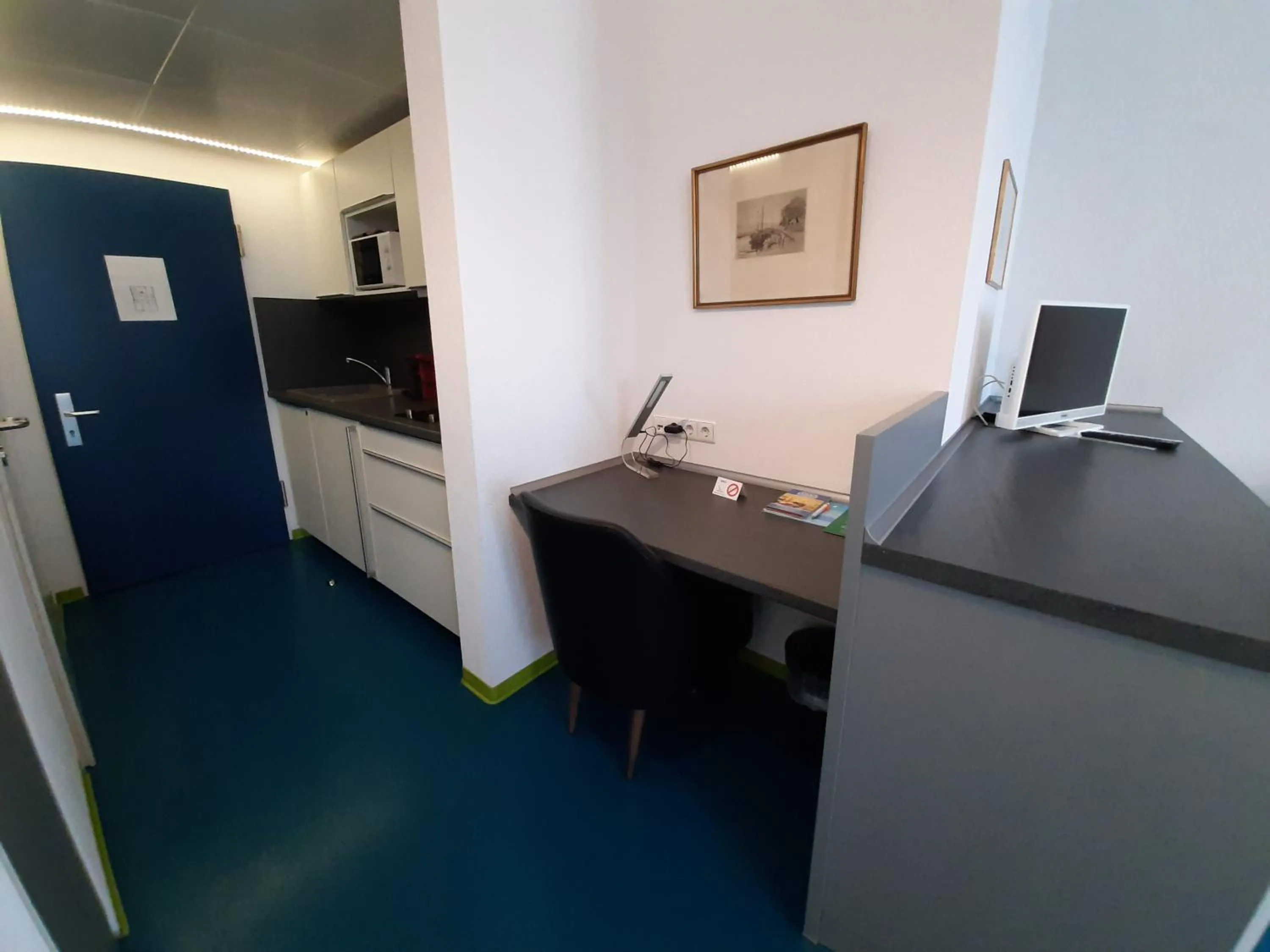 Kitchen or kitchenette in Domus Hotel