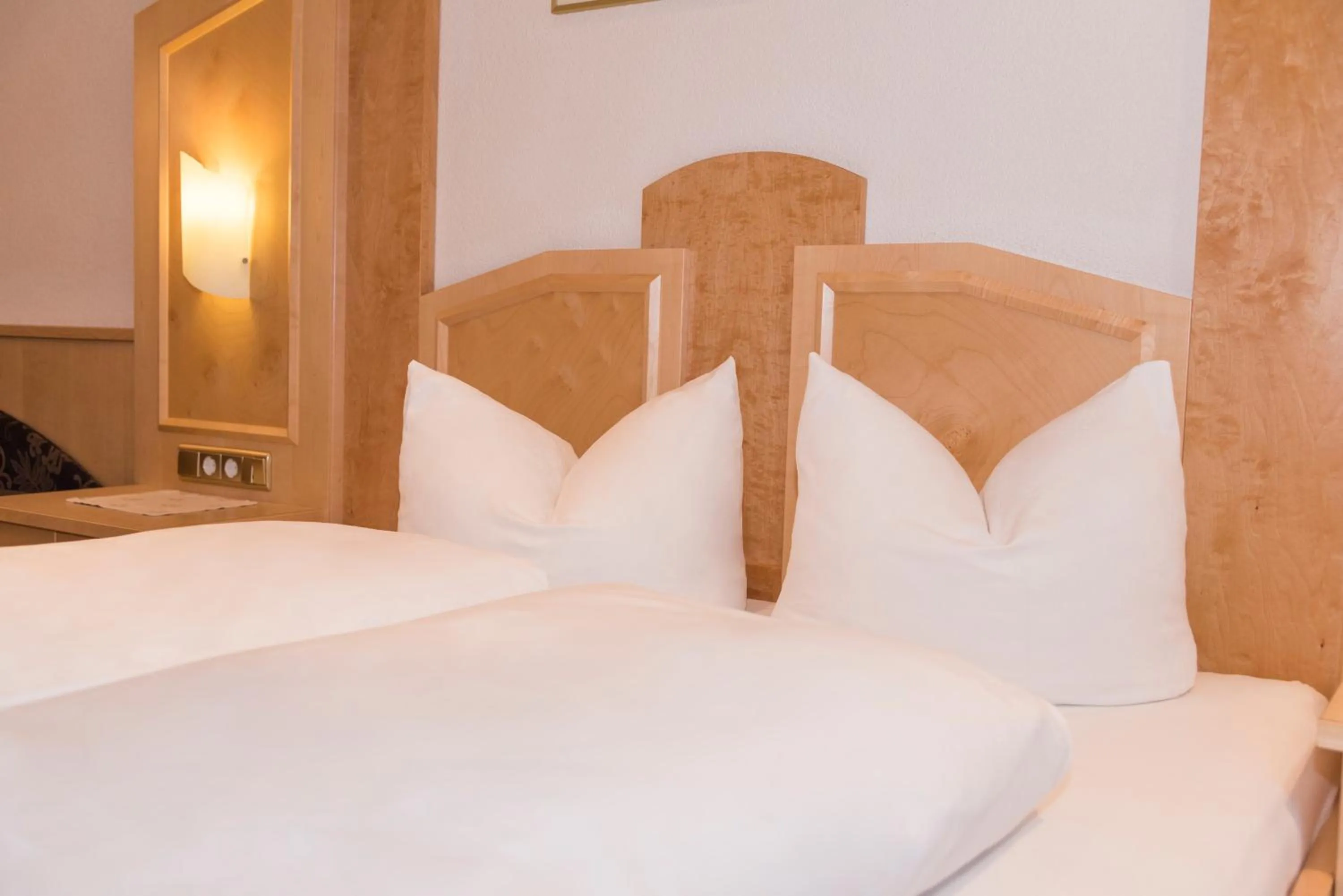 Bed in Alphotel Garni Salner