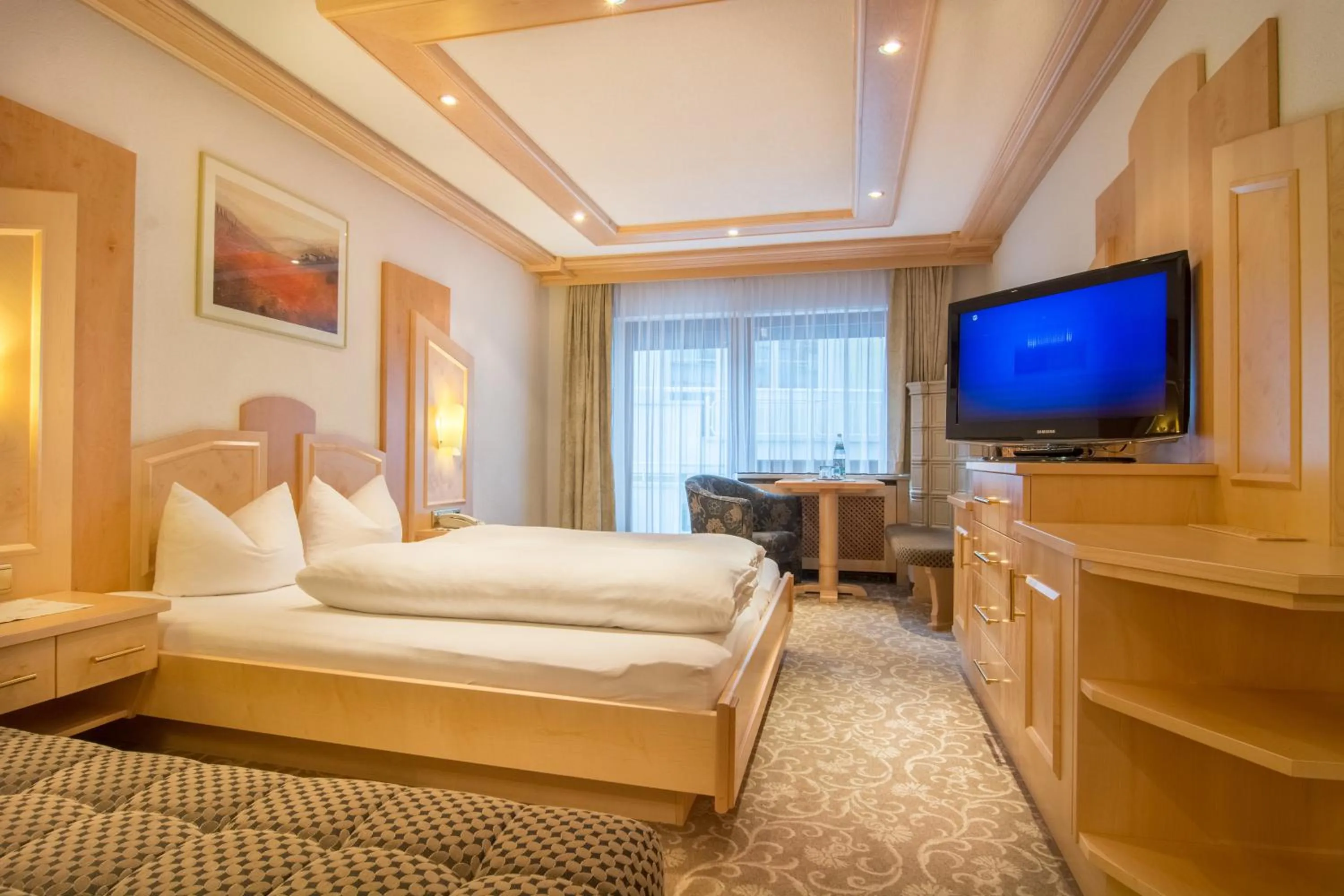 Bed in Alphotel Garni Salner