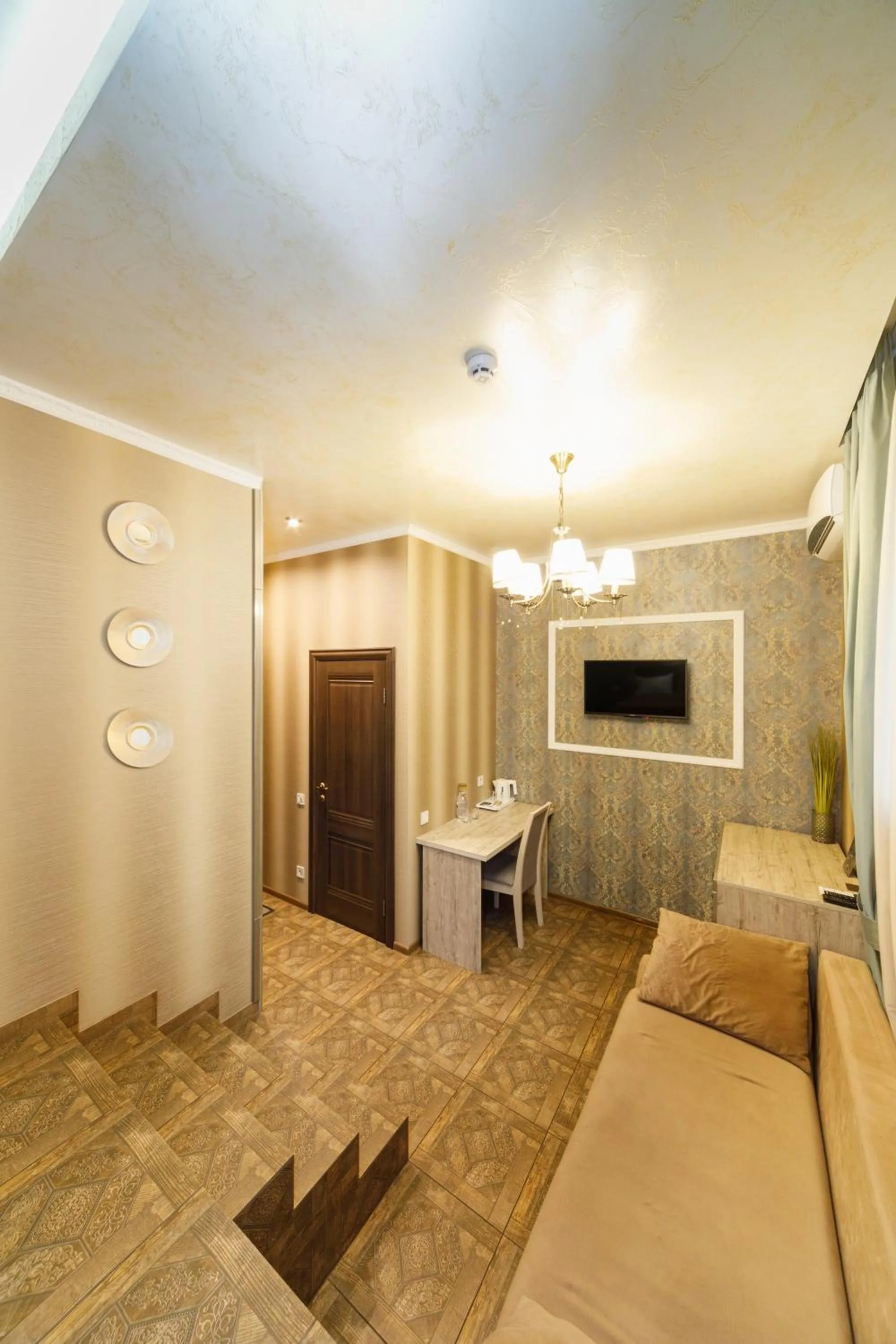 Bed in L.O.Y Family Hotel