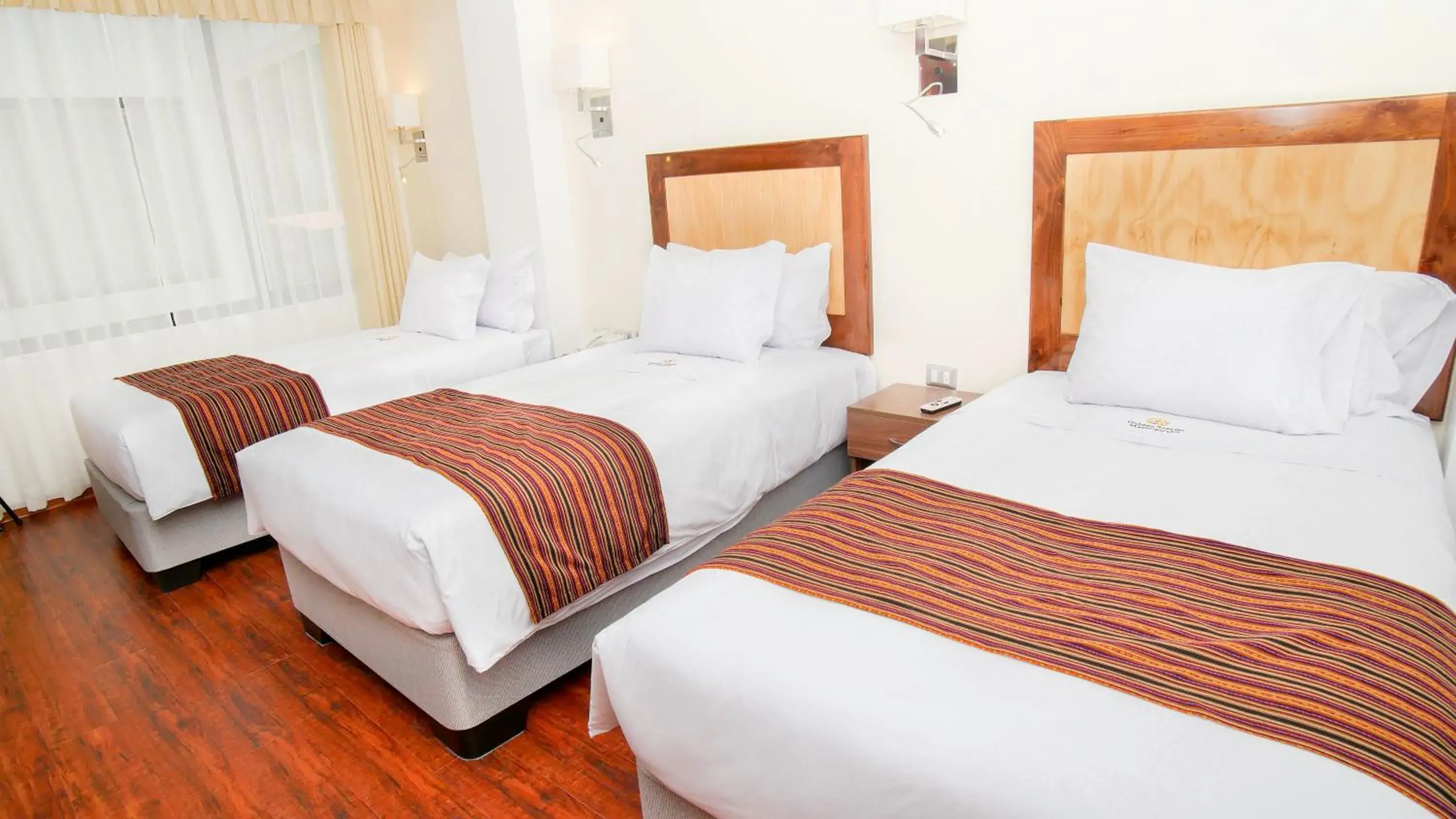 Classic Triple Room in Golden Sunrise Machupicchu Classic Triple Room in Golden Sunrise Machupicchu