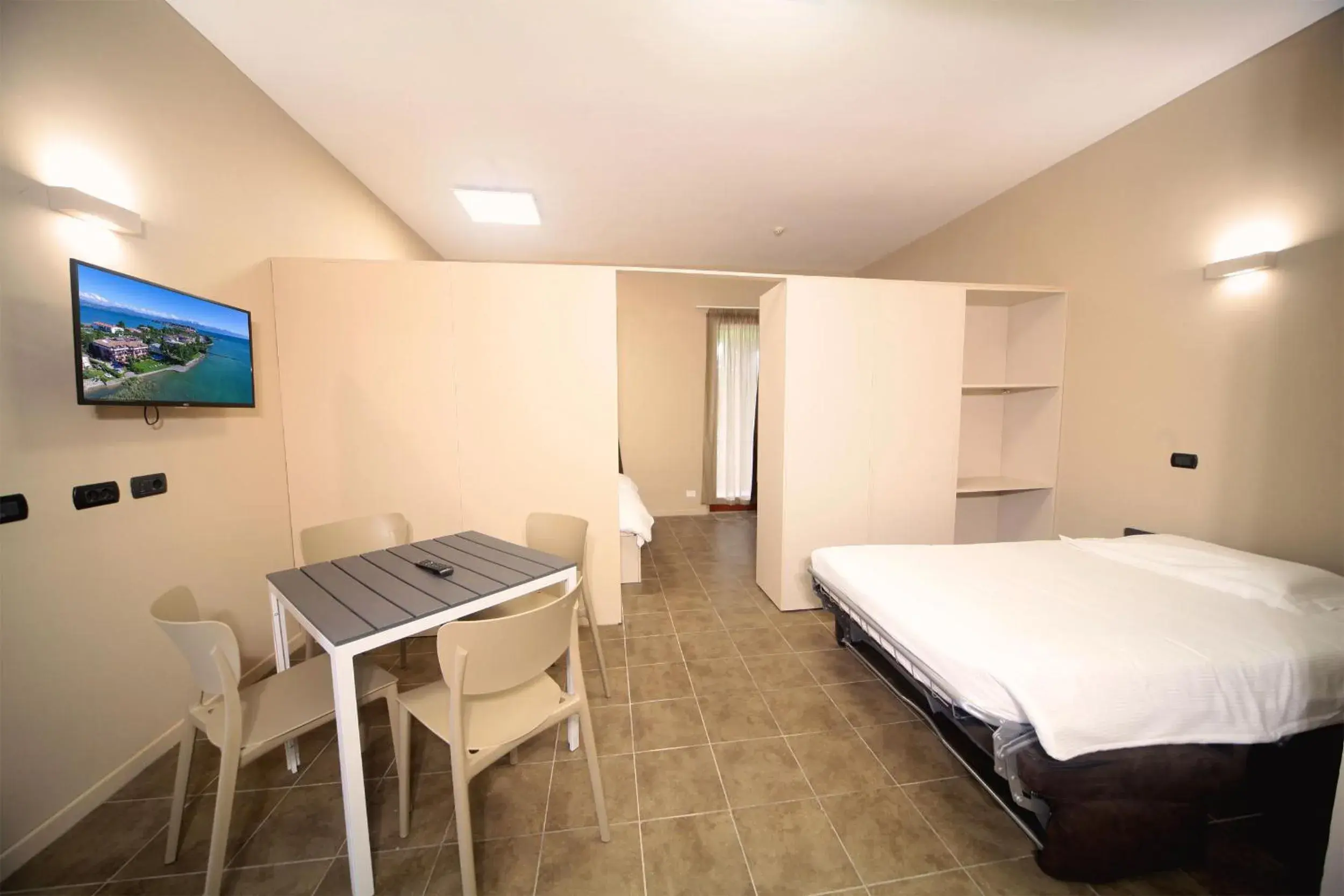 Bed in Hotel Smeraldo Bed in Hotel Smeraldo