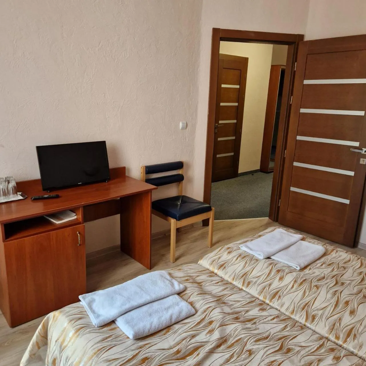 Bed in Hotel Helikon