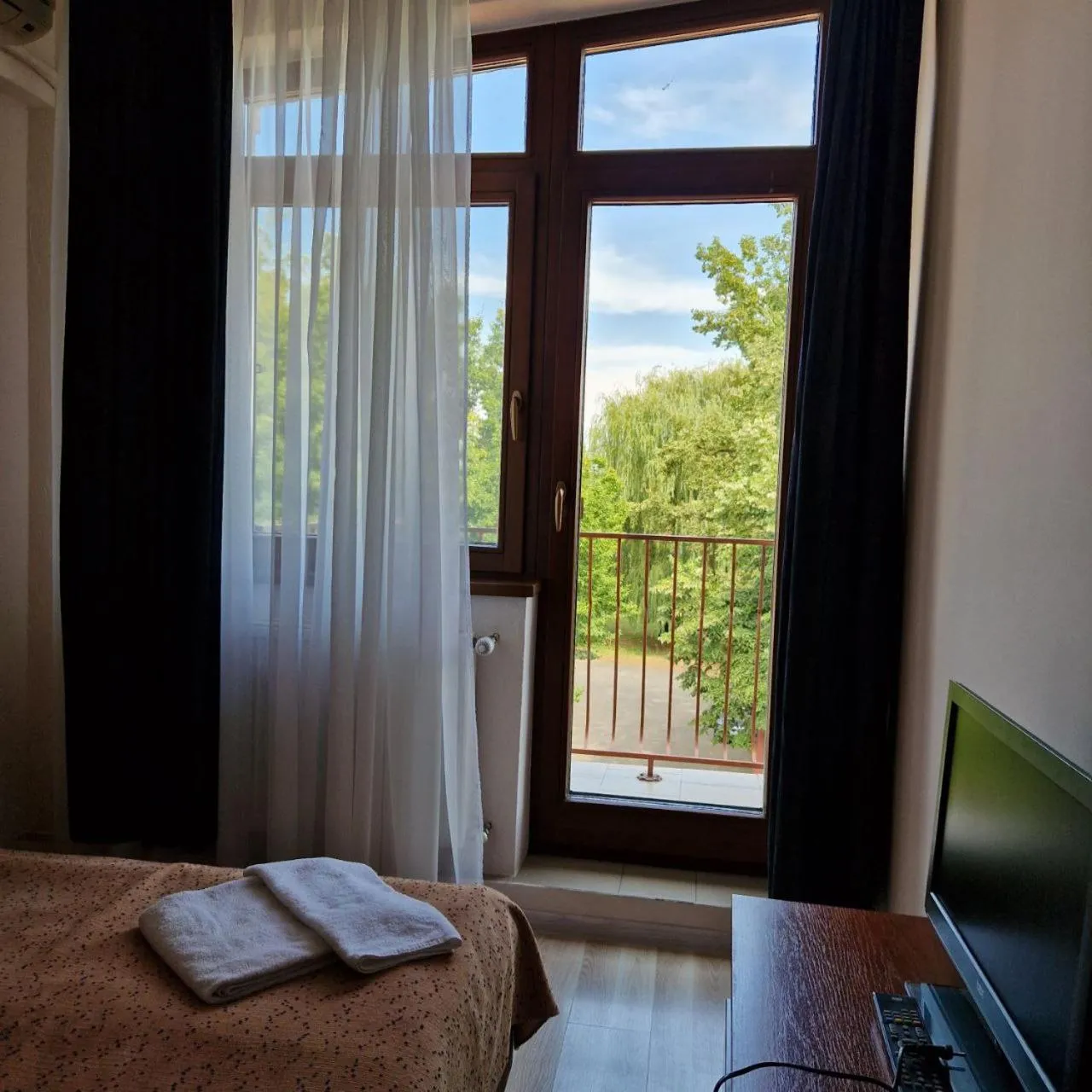 Bed in Hotel Helikon