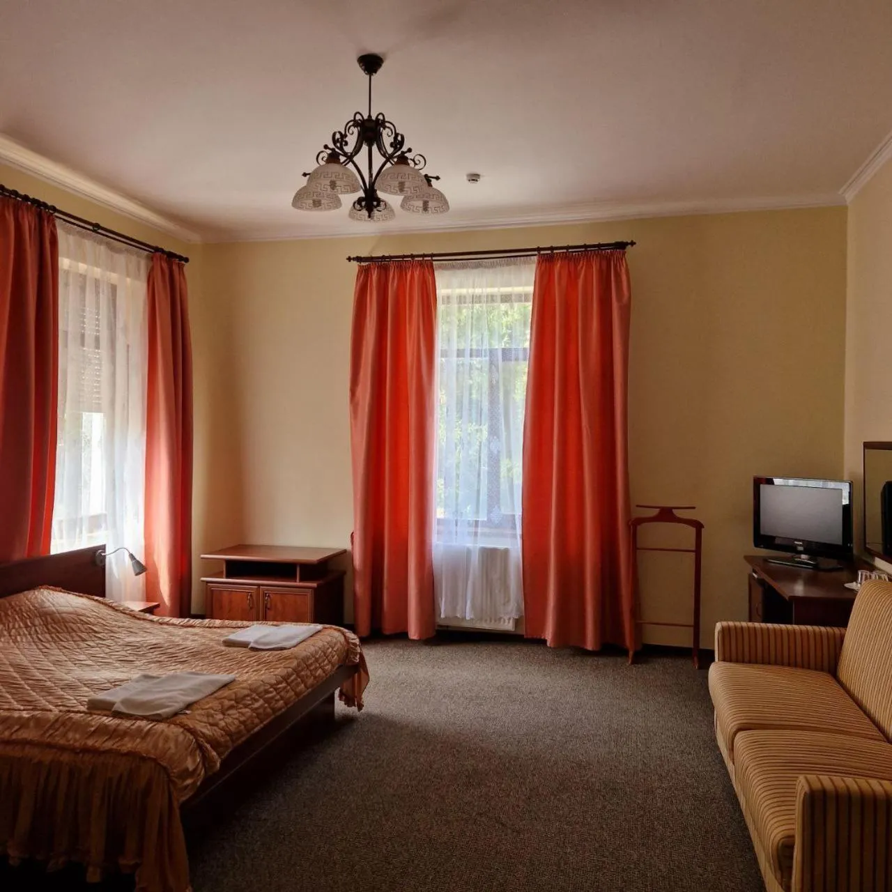 Bed in Hotel Helikon