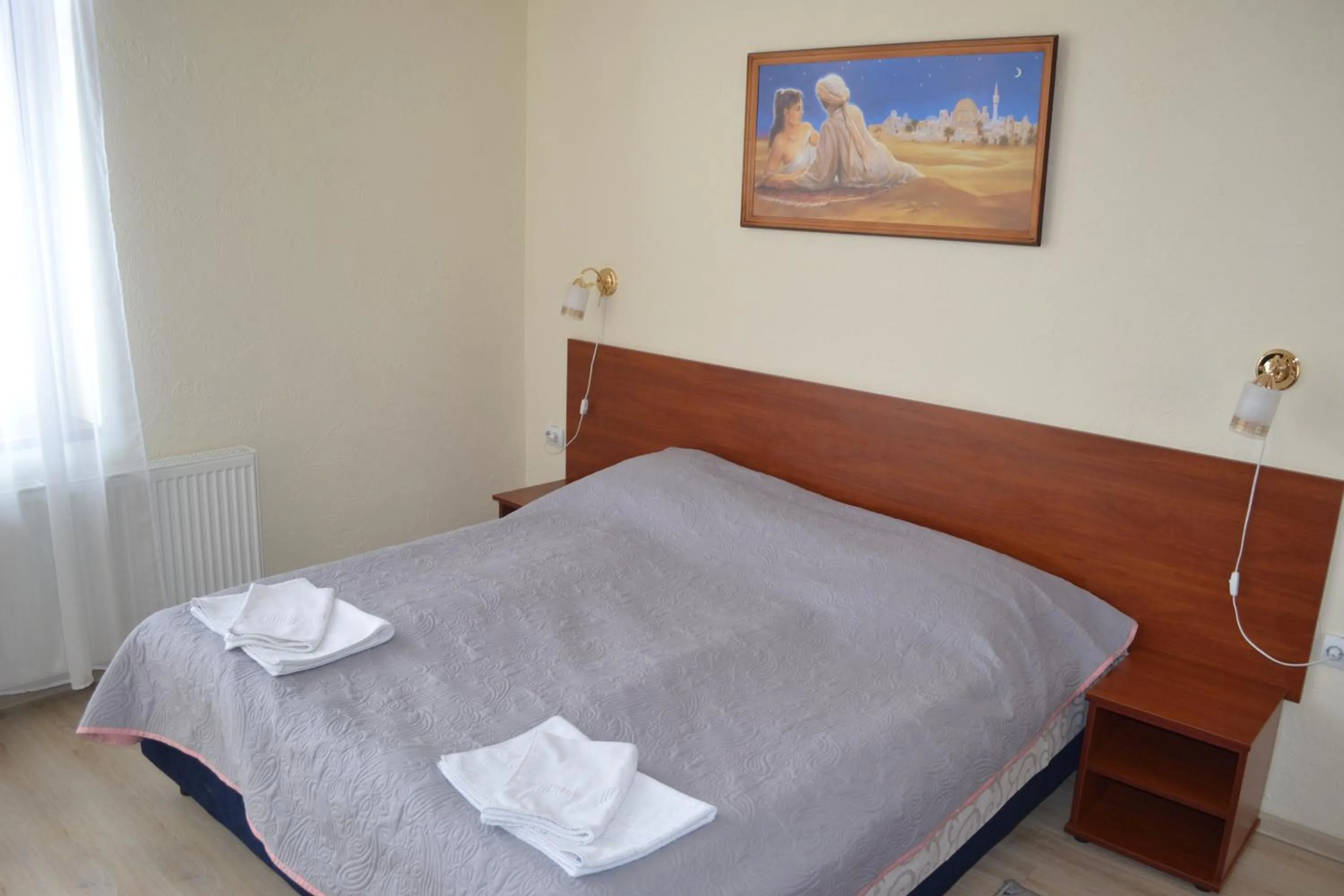 Bed in Hotel Helikon