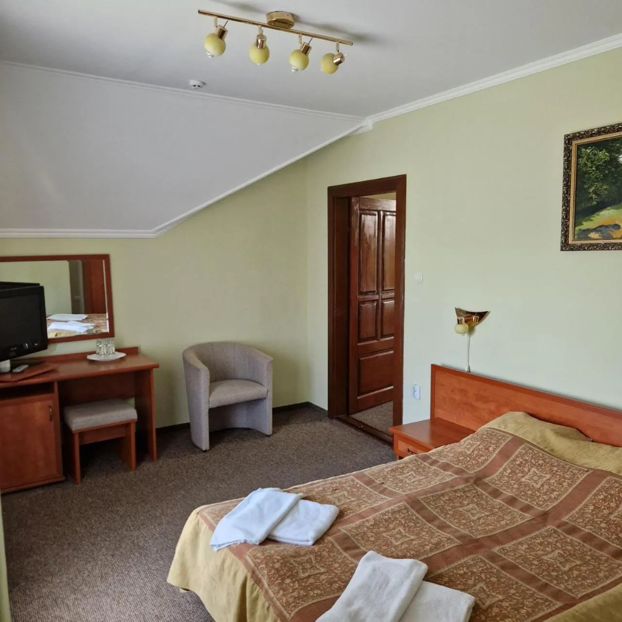 Bed in Hotel Helikon