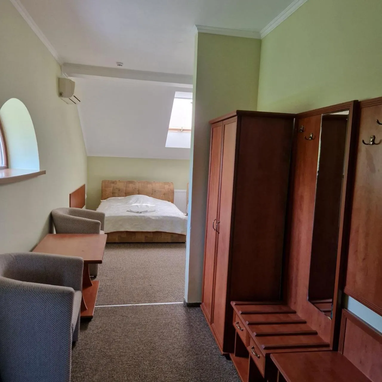 Bed in Hotel Helikon