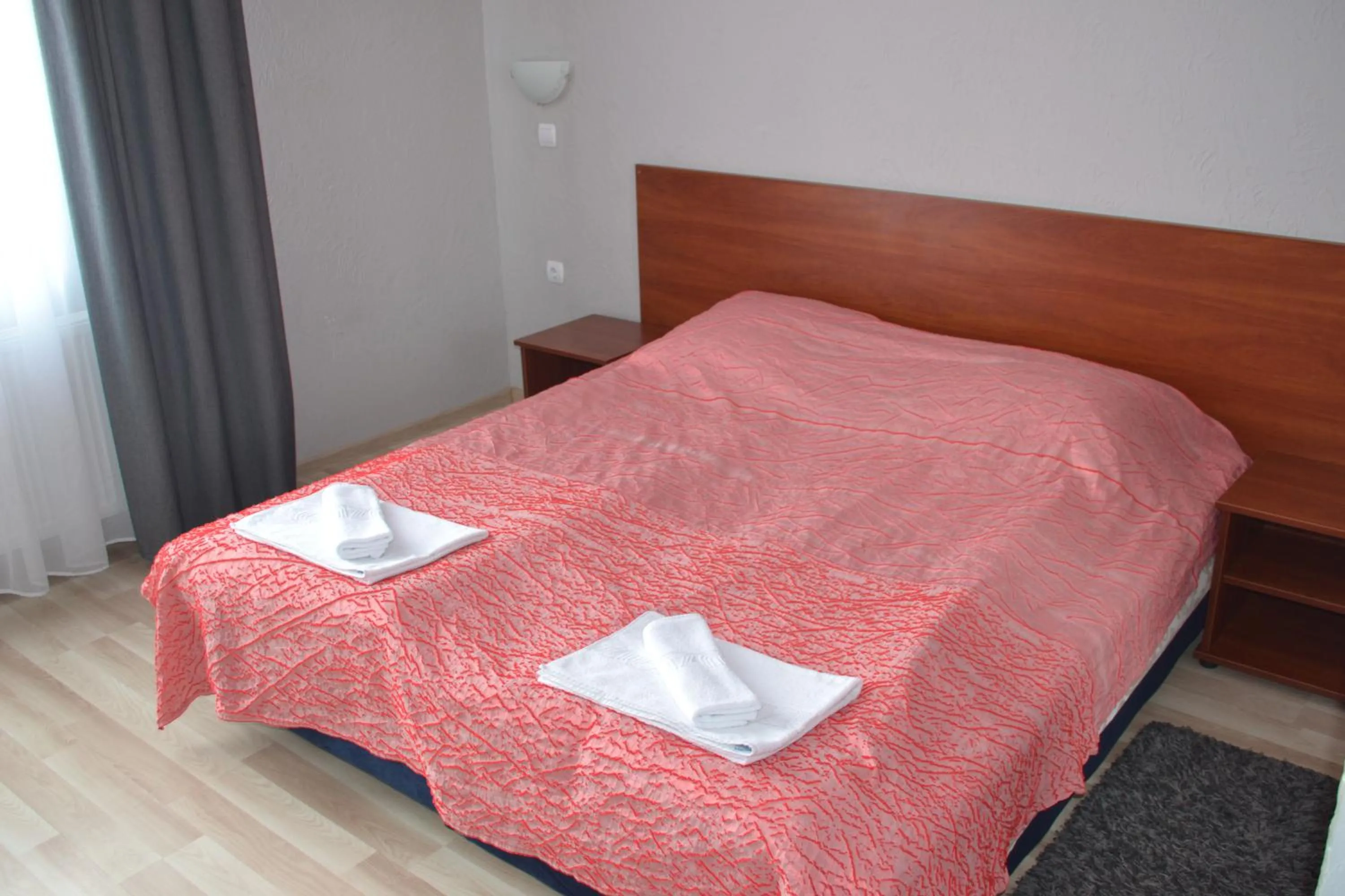 Bed in Hotel Helikon