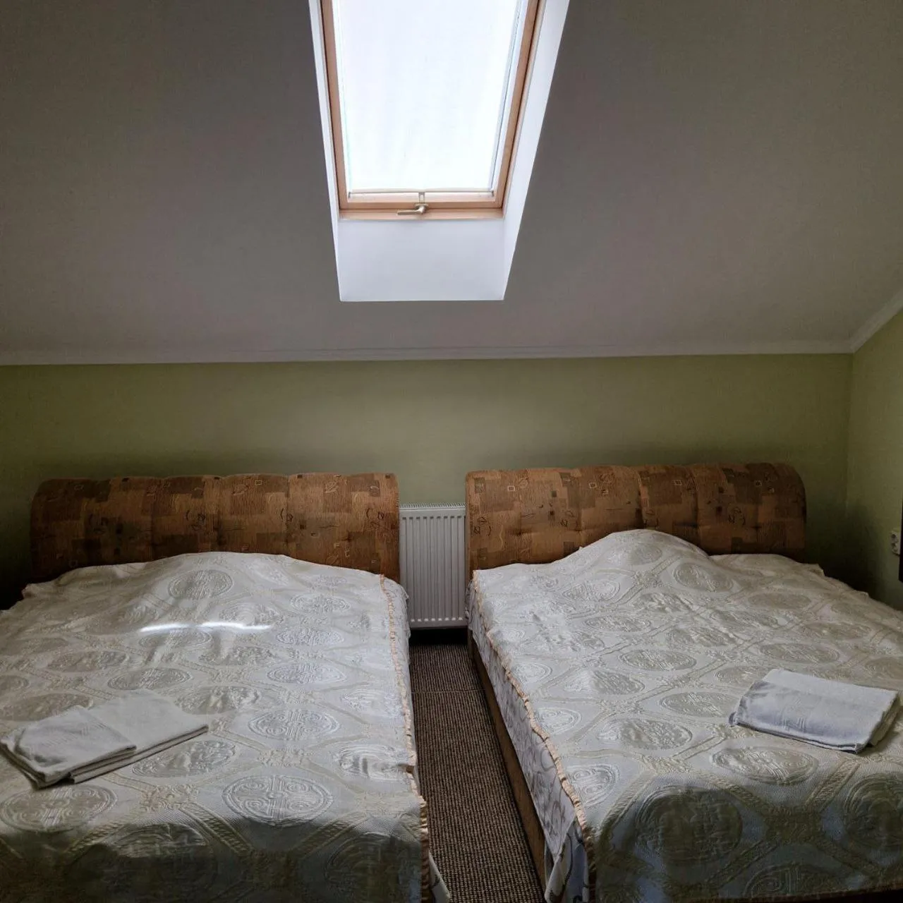 Bed in Hotel Helikon
