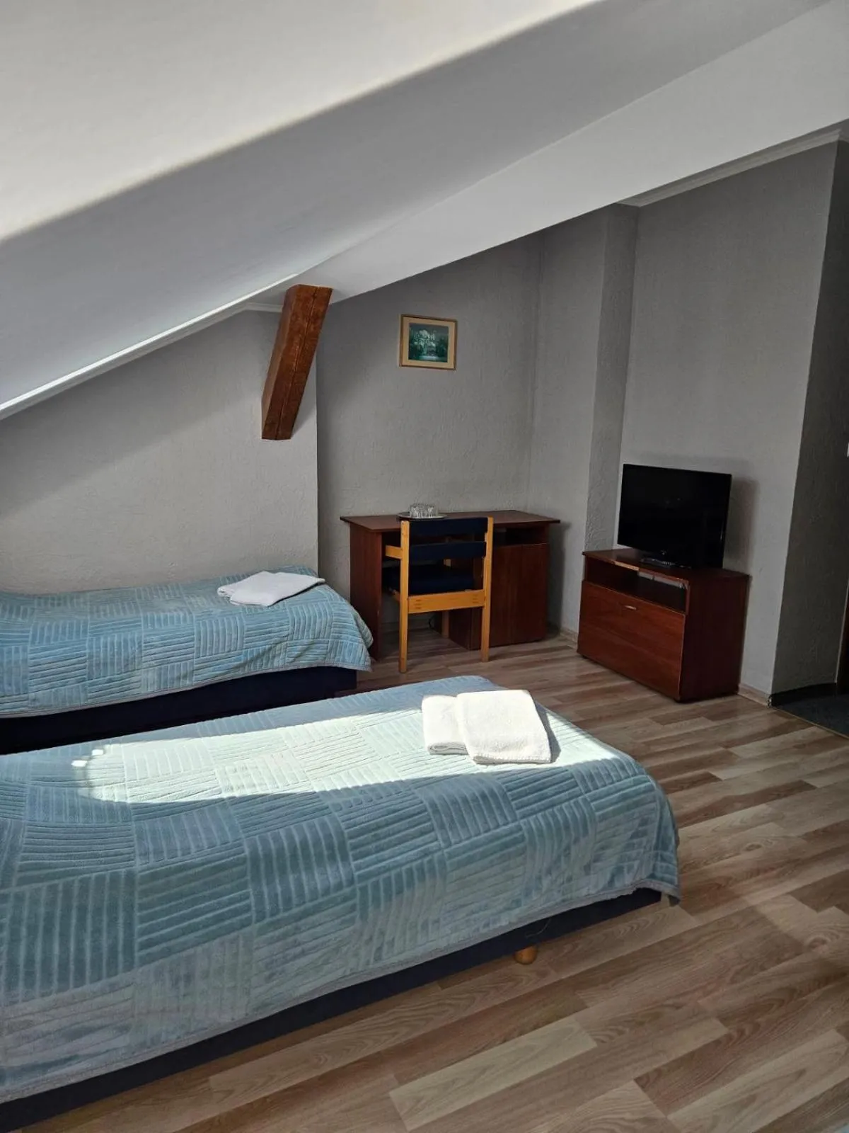 Bed in Hotel Helikon