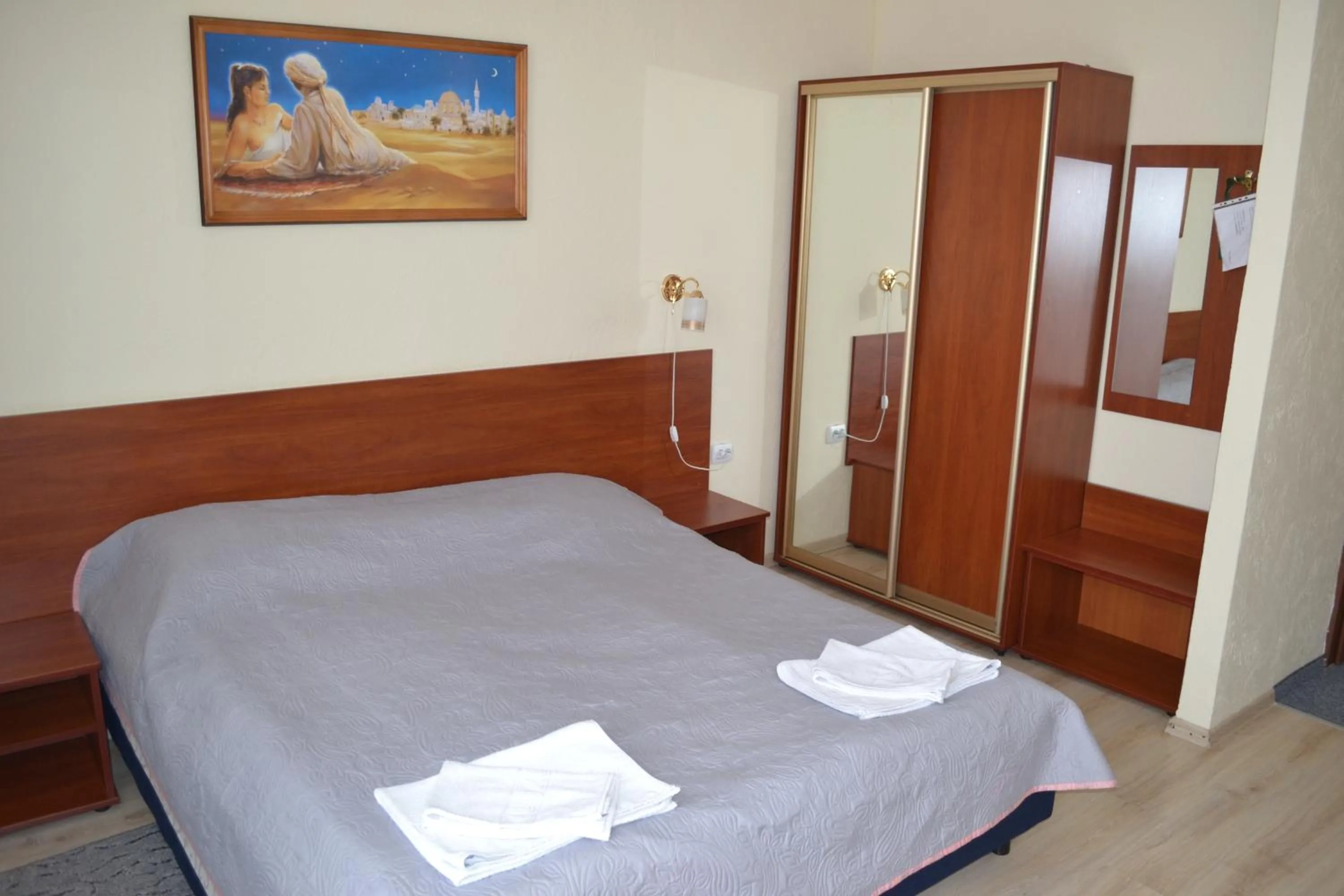 Bed in Hotel Helikon