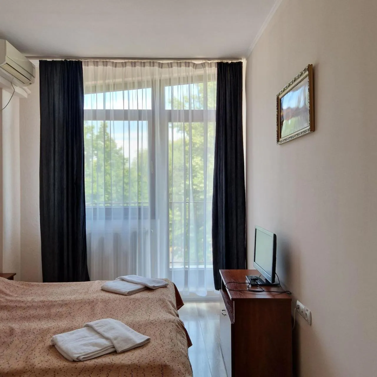 Bed in Hotel Helikon