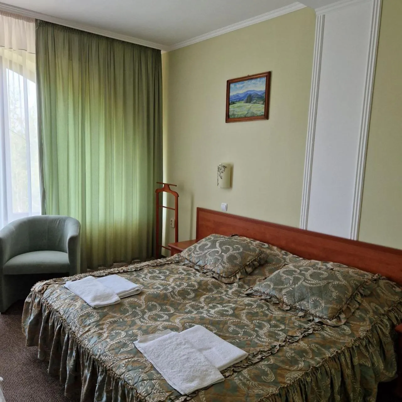 Bed in Hotel Helikon
