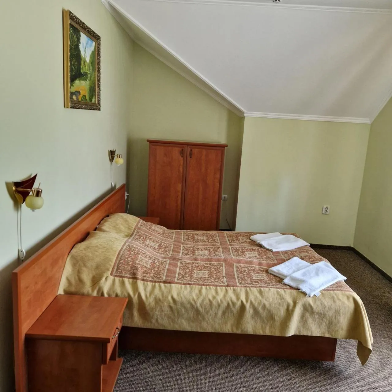 Bed in Hotel Helikon