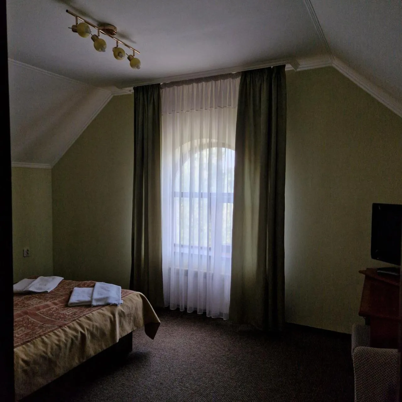 Bed in Hotel Helikon