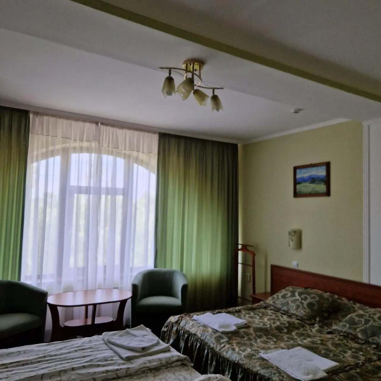 Bed in Hotel Helikon