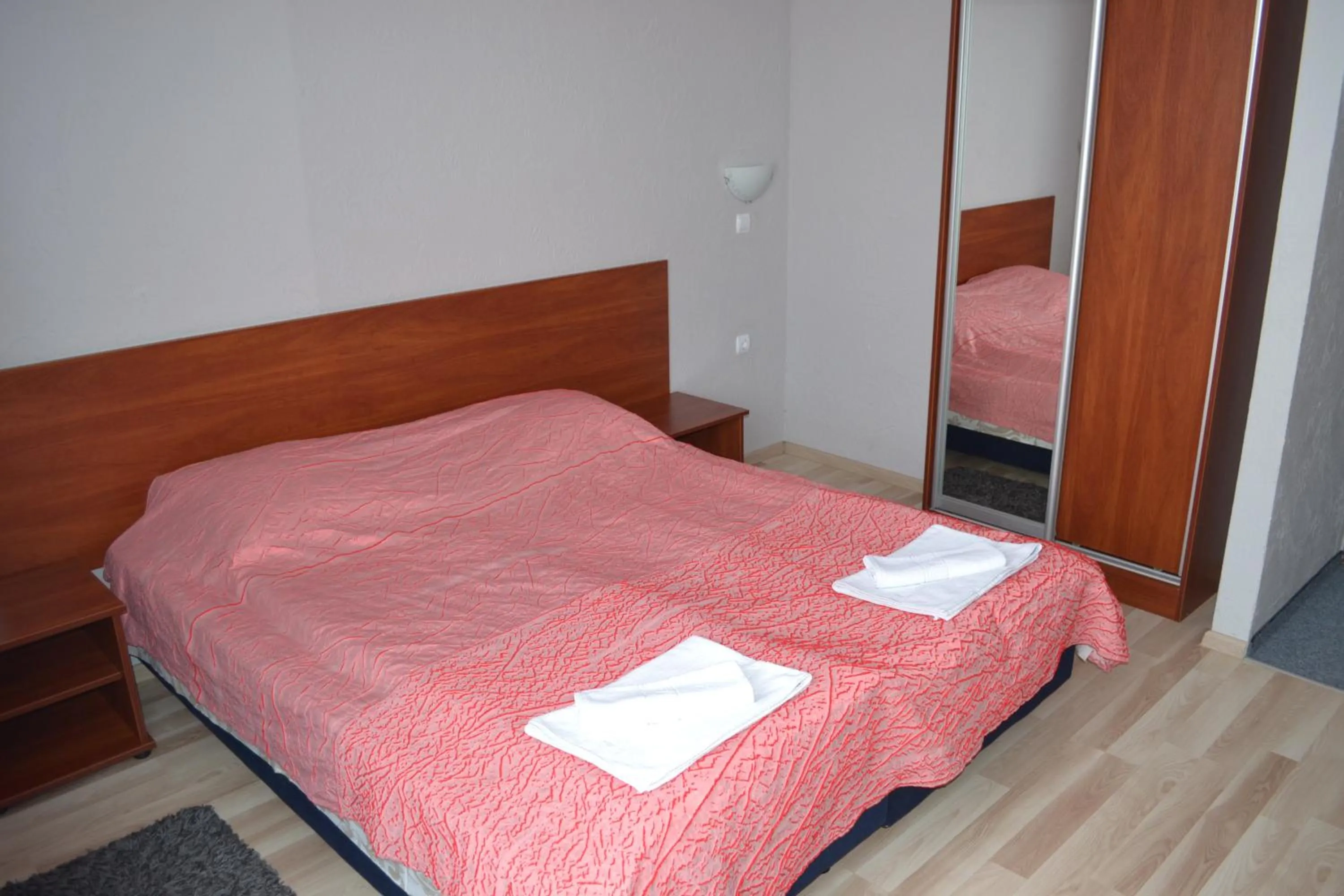 Bed in Hotel Helikon