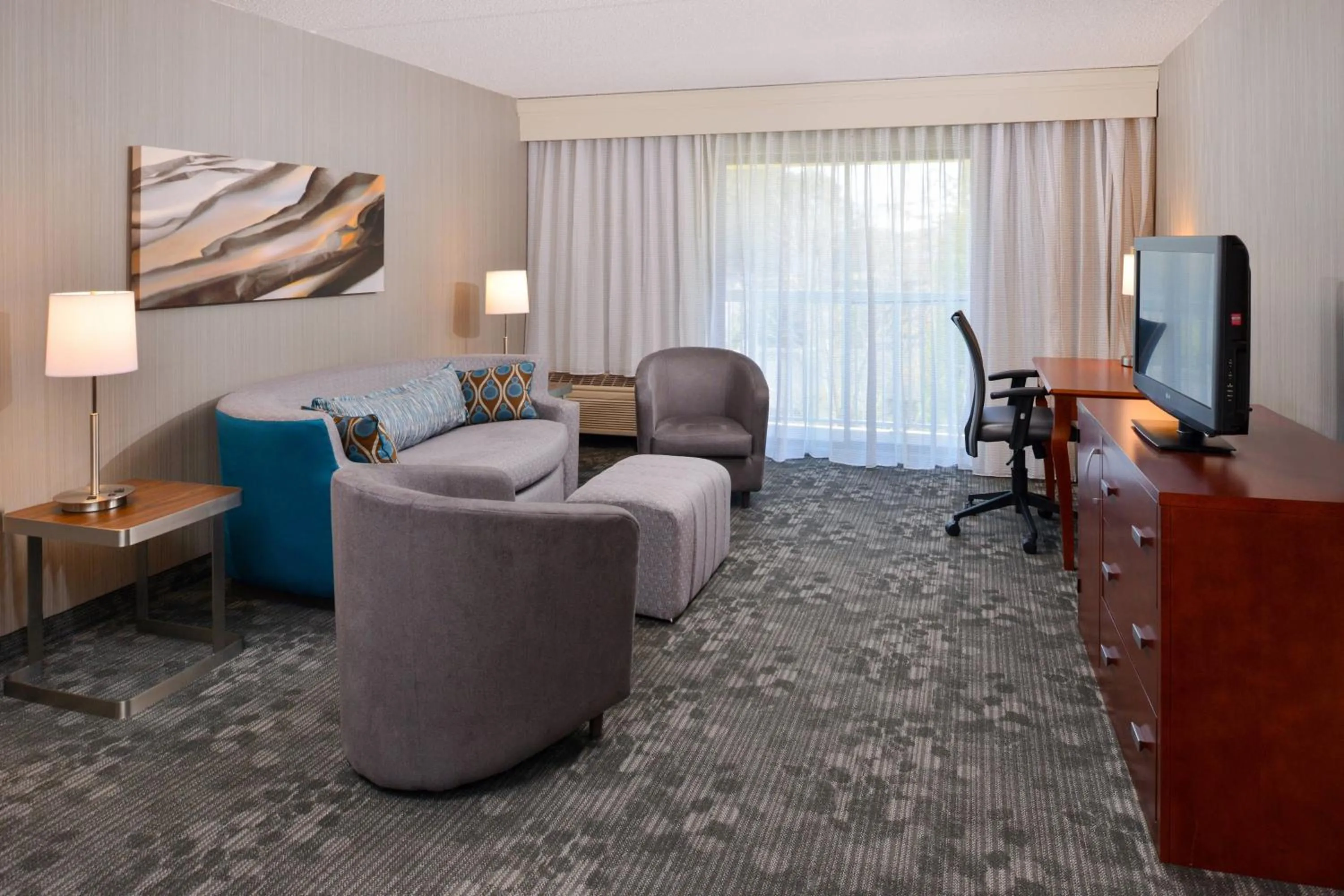 Living room in Courtyard by Marriott Charlotte Gastonia