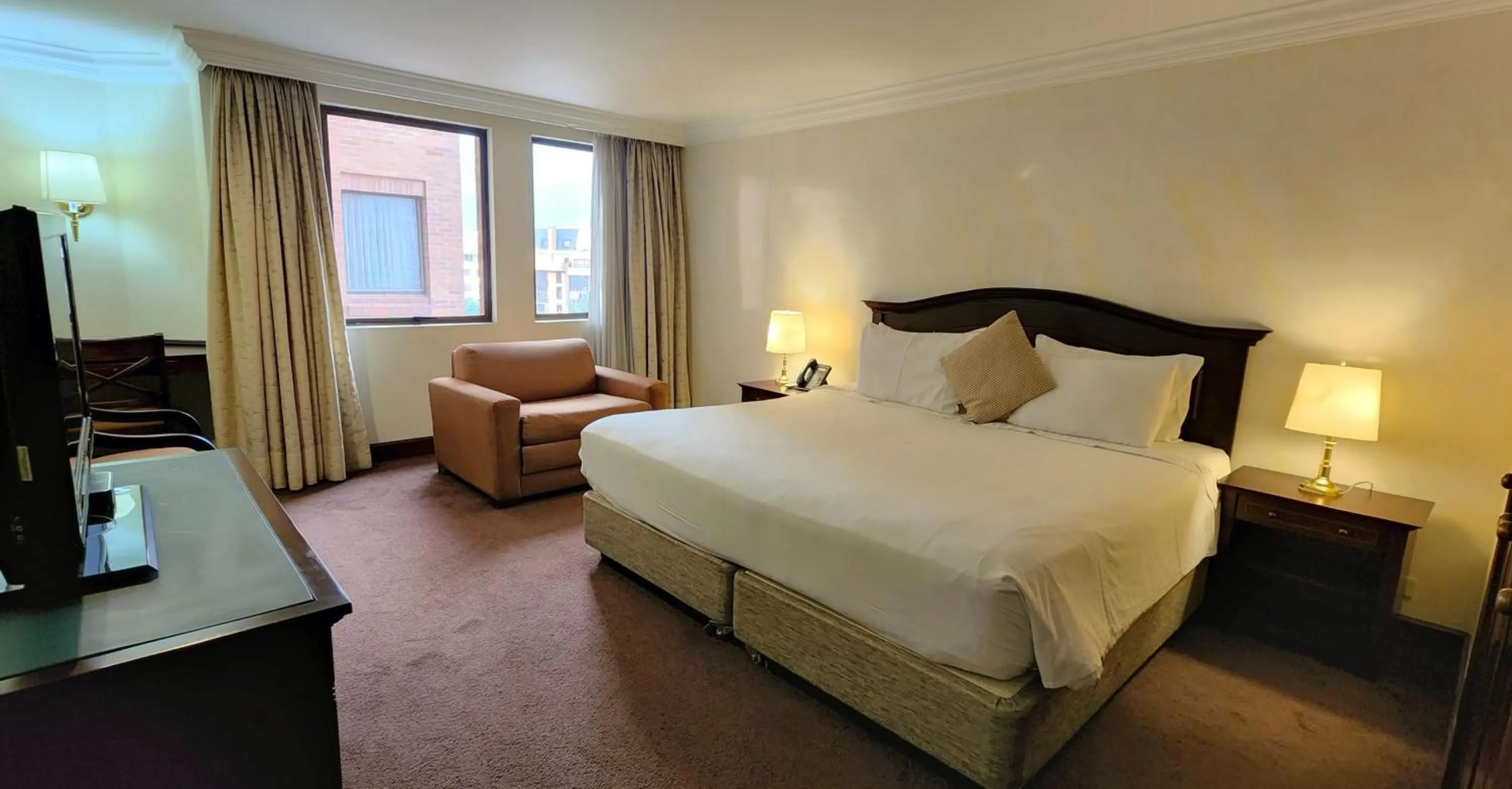 Bed in Santafe Boutique Hotel