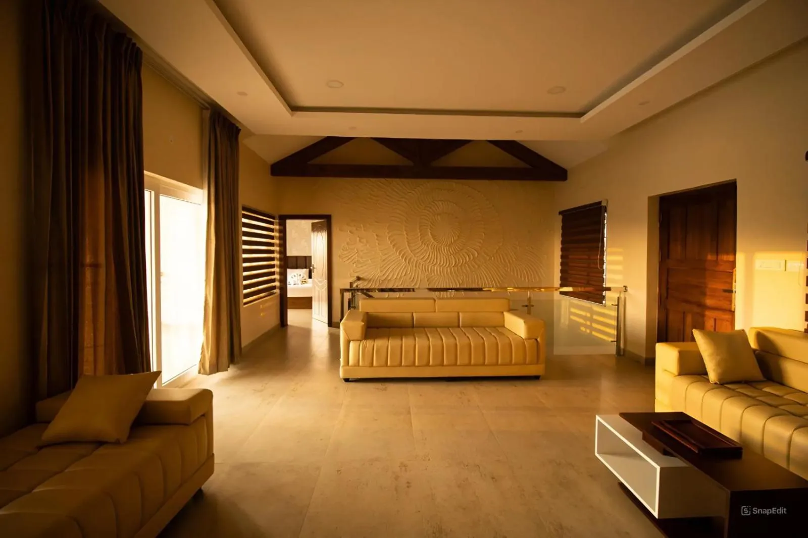 Living room, Bed in Elixir Hills Suites Resort and Spa