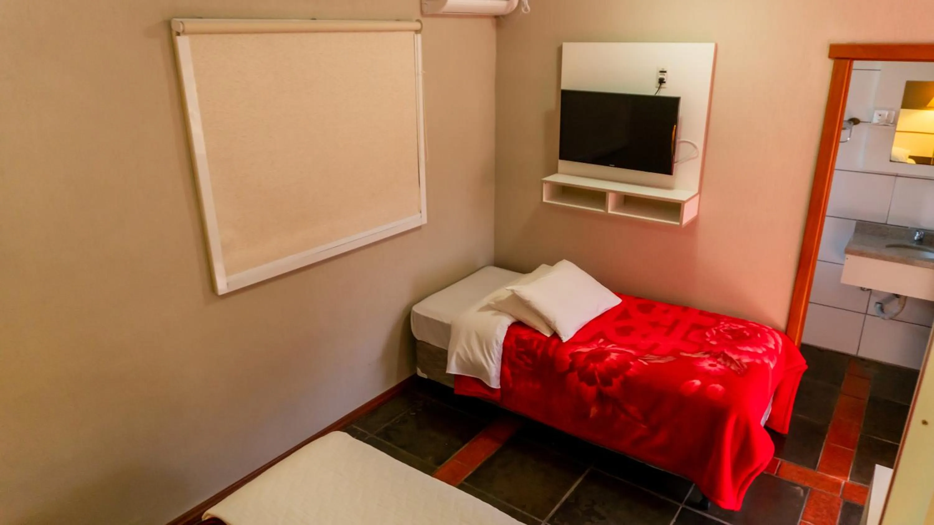 Bed in Aardvark Inn Pousada