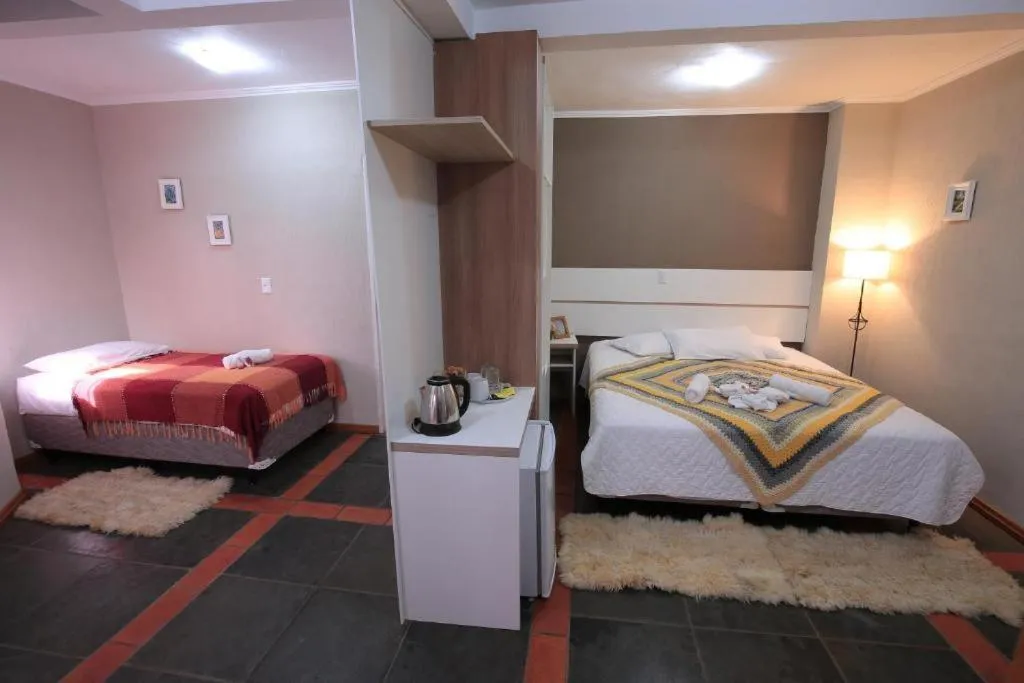 Bed in Aardvark Inn Pousada