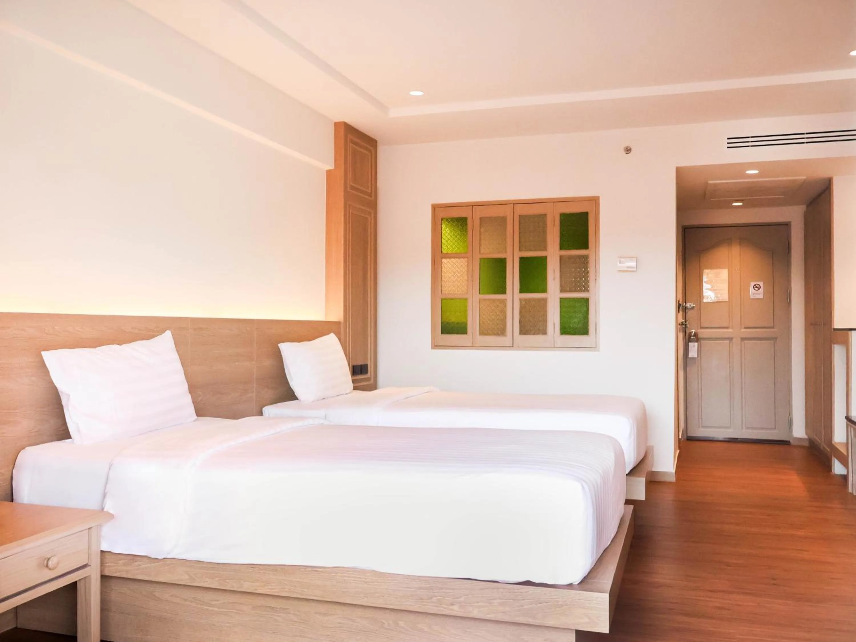 Photo of the whole room, Bed in Phuket Orchid Resort and Spa