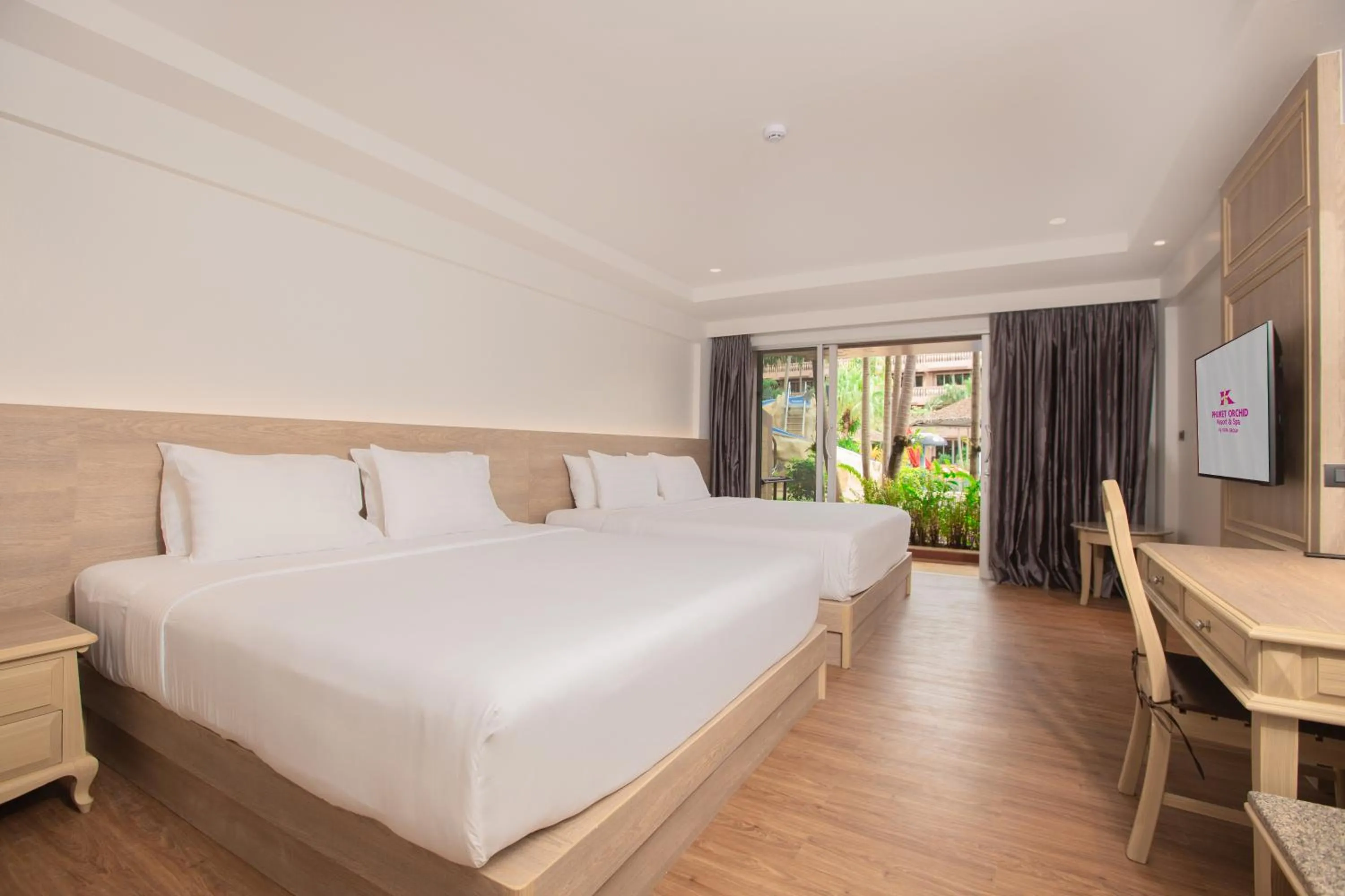 Bed in Phuket Orchid Resort and Spa