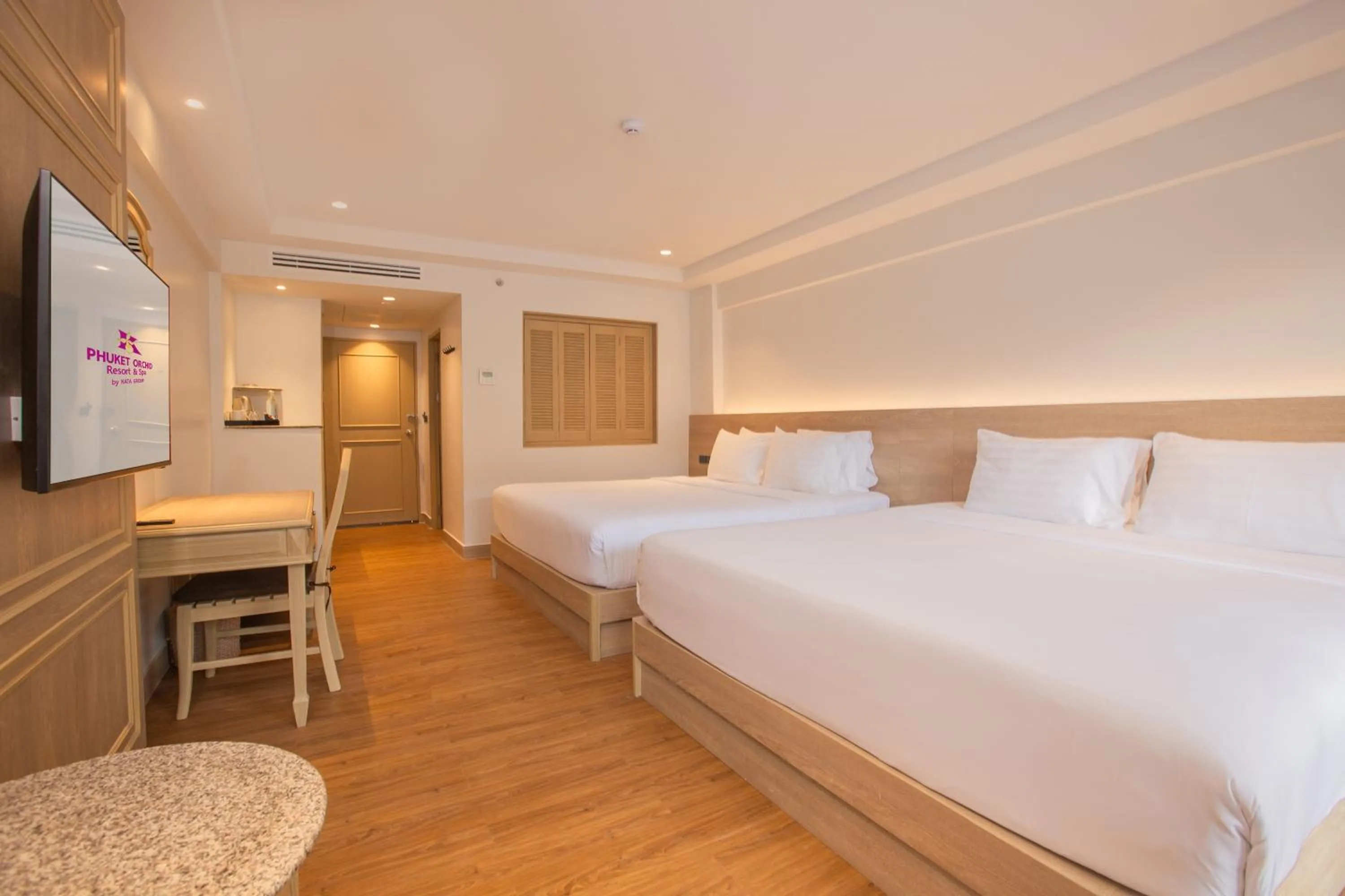 Bed in Phuket Orchid Resort and Spa