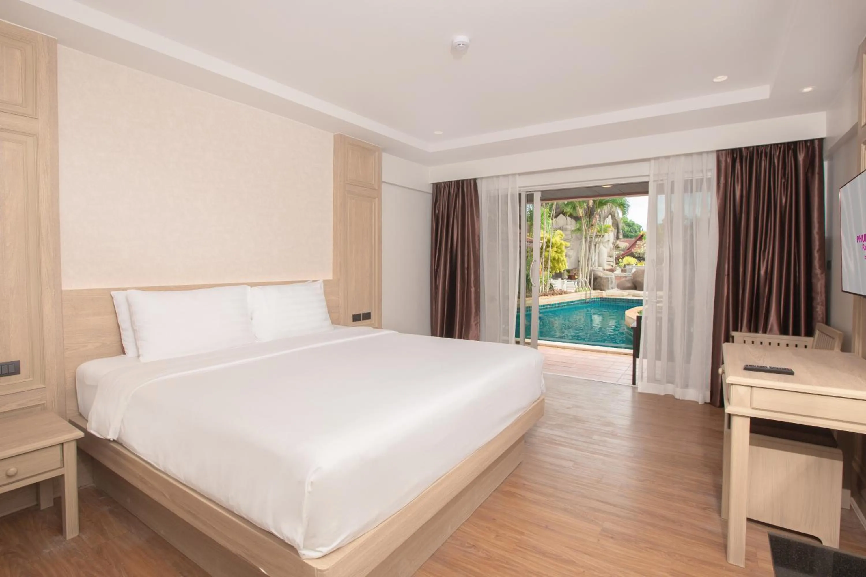 Bed in Phuket Orchid Resort and Spa