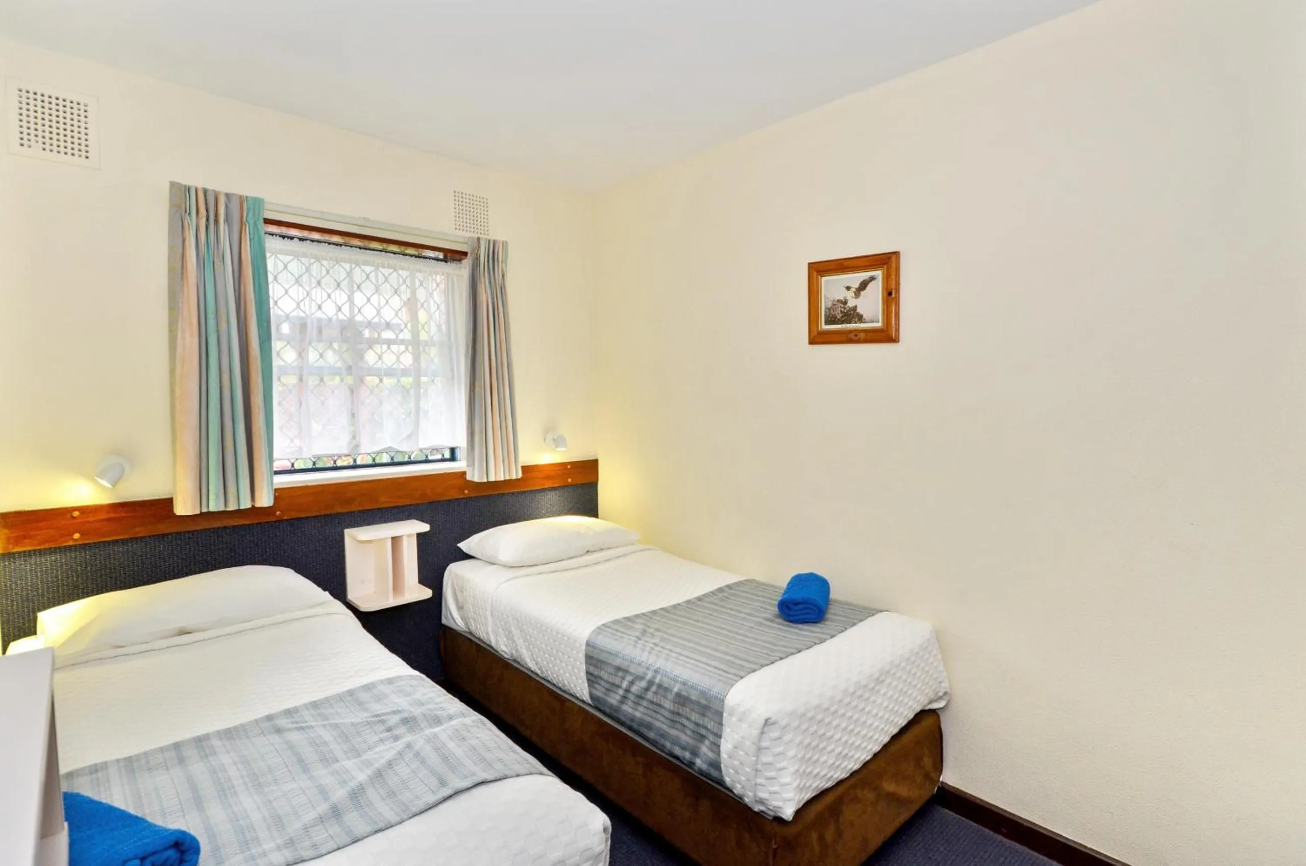 Bedroom, Bed in Dolphin Lodge Albany - Self Contained Apartments at Middleton Beach