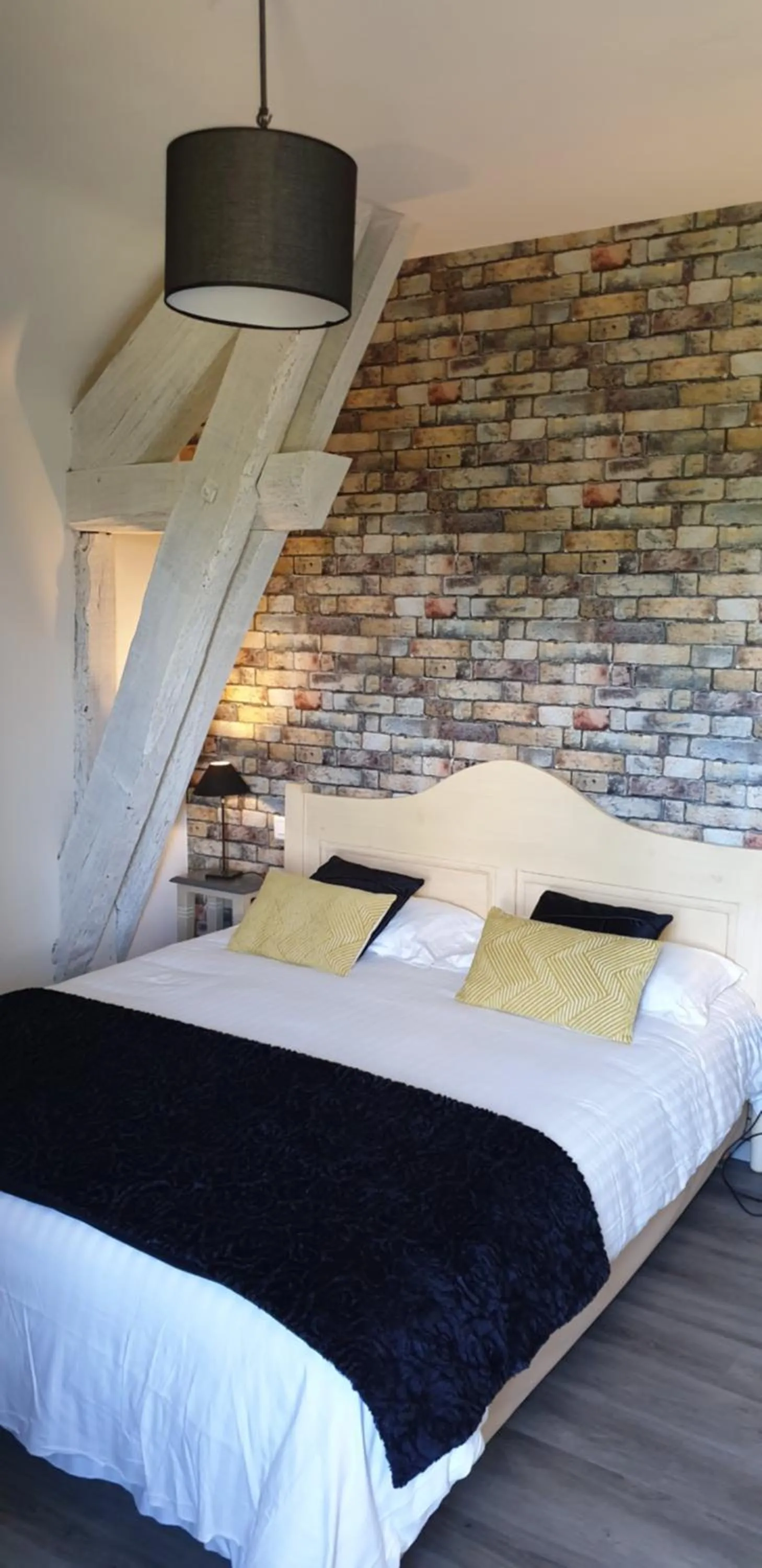 Bed in Logis Hôtel Auberge de Cartassac