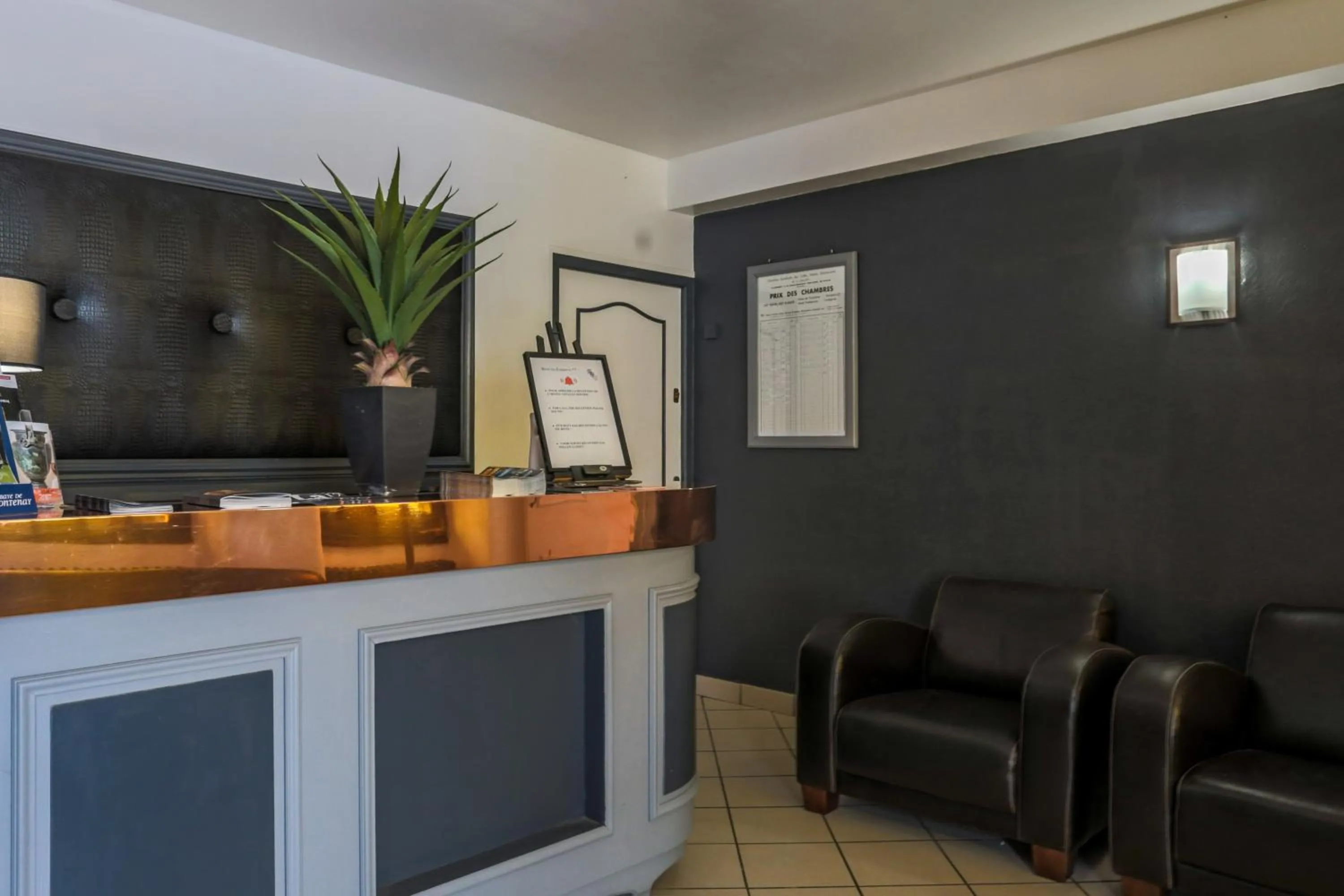 Lobby or reception in Hotel du Commerce