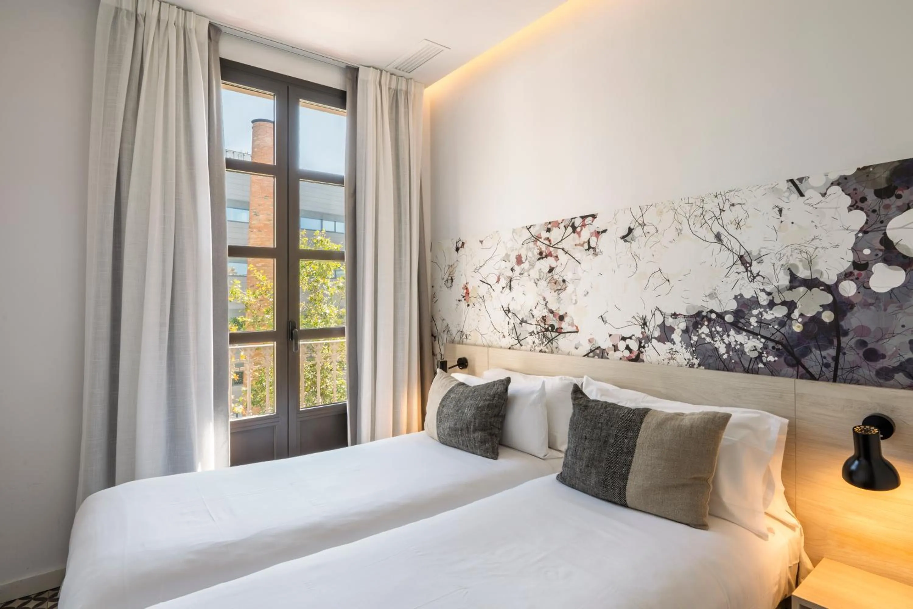 Bed in Aspasios Poble Nou Apartments