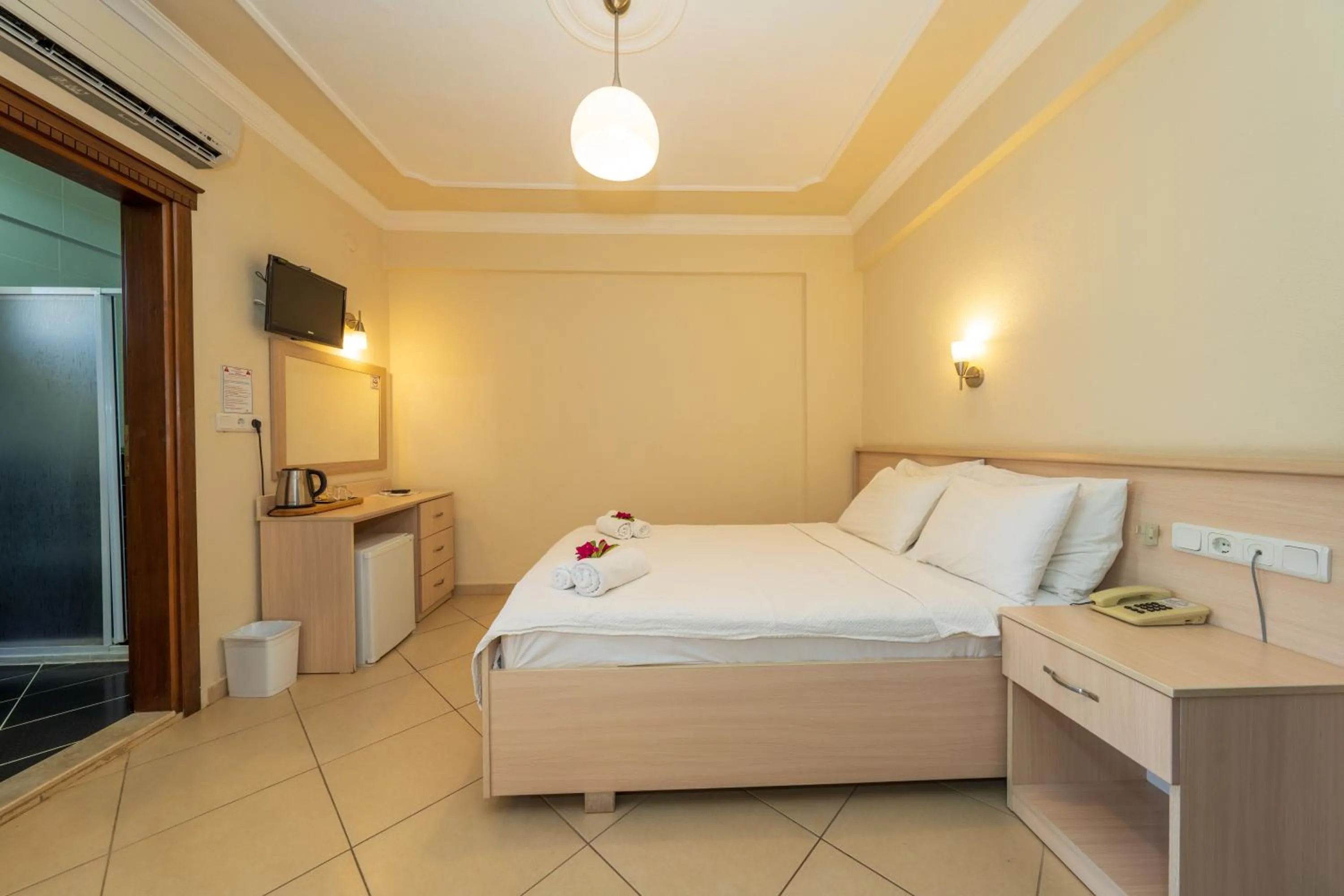 Bed in Gokcen Hotel & Apartments