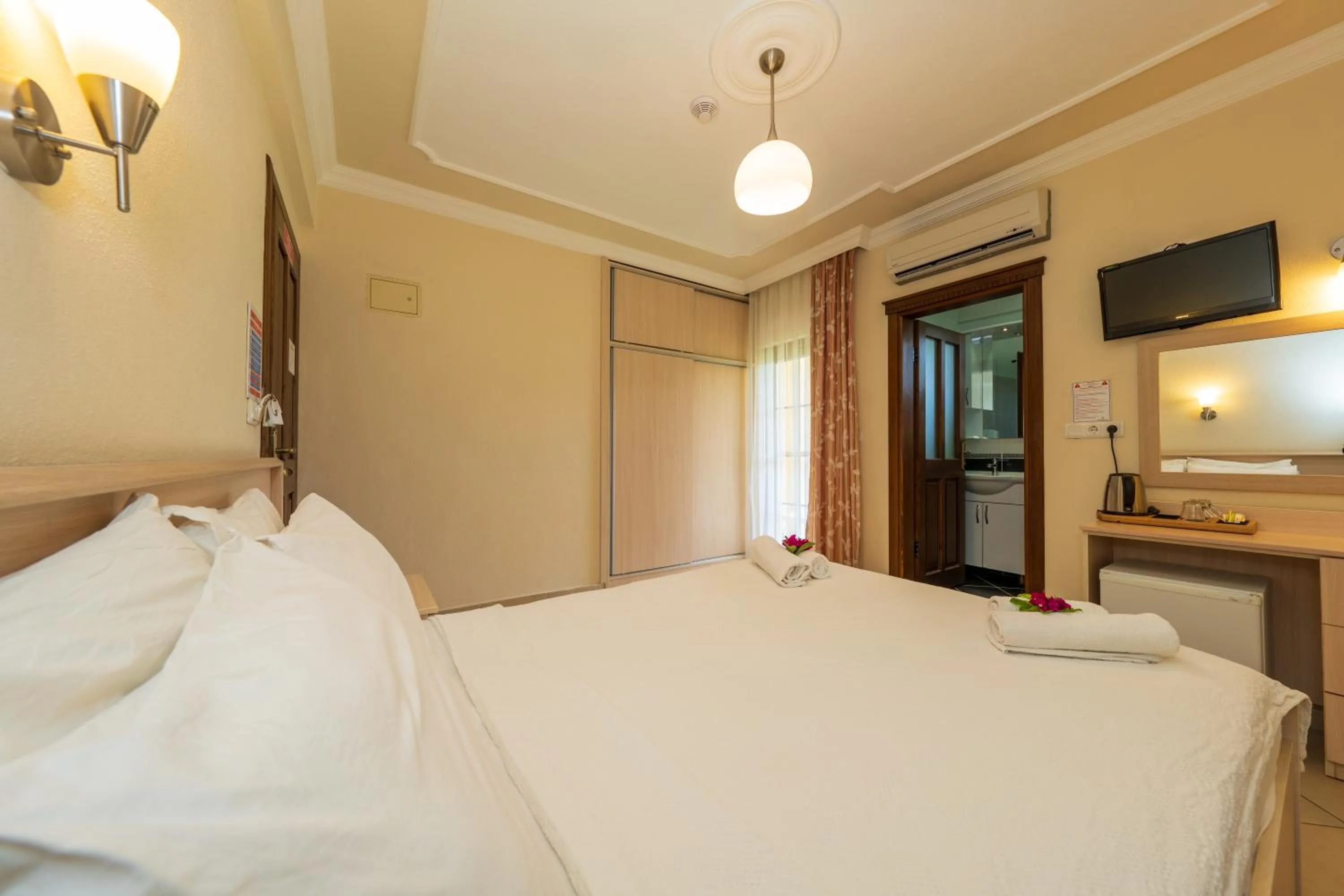 Bed in Gokcen Hotel & Apartments